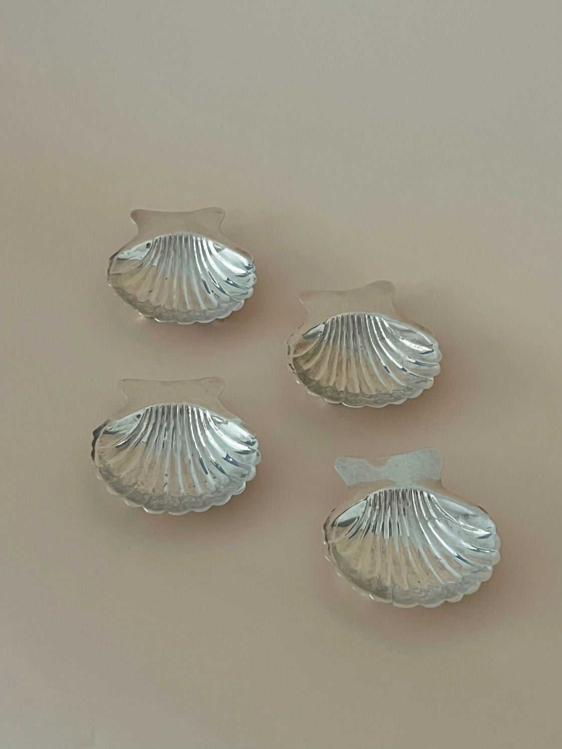 Four Sterling Silver Aperitif Plates