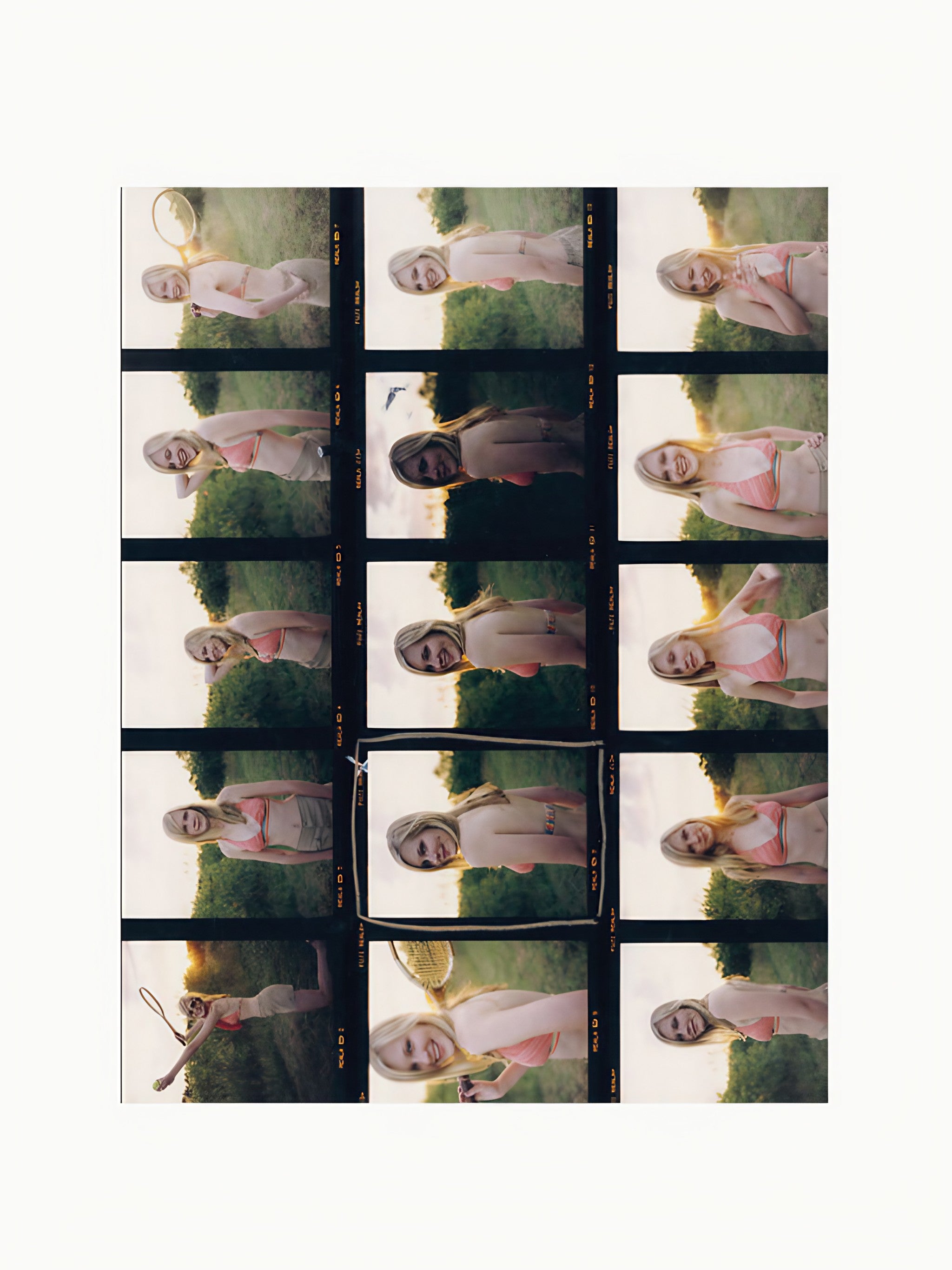 A Archive Sofia Coppola film strip featuring multiple frames of a woman in a pink dress and sunhat, posed in a grassy field during golden hour, interacting with bubbles. Some frames capture her smiling or looking whimsically.