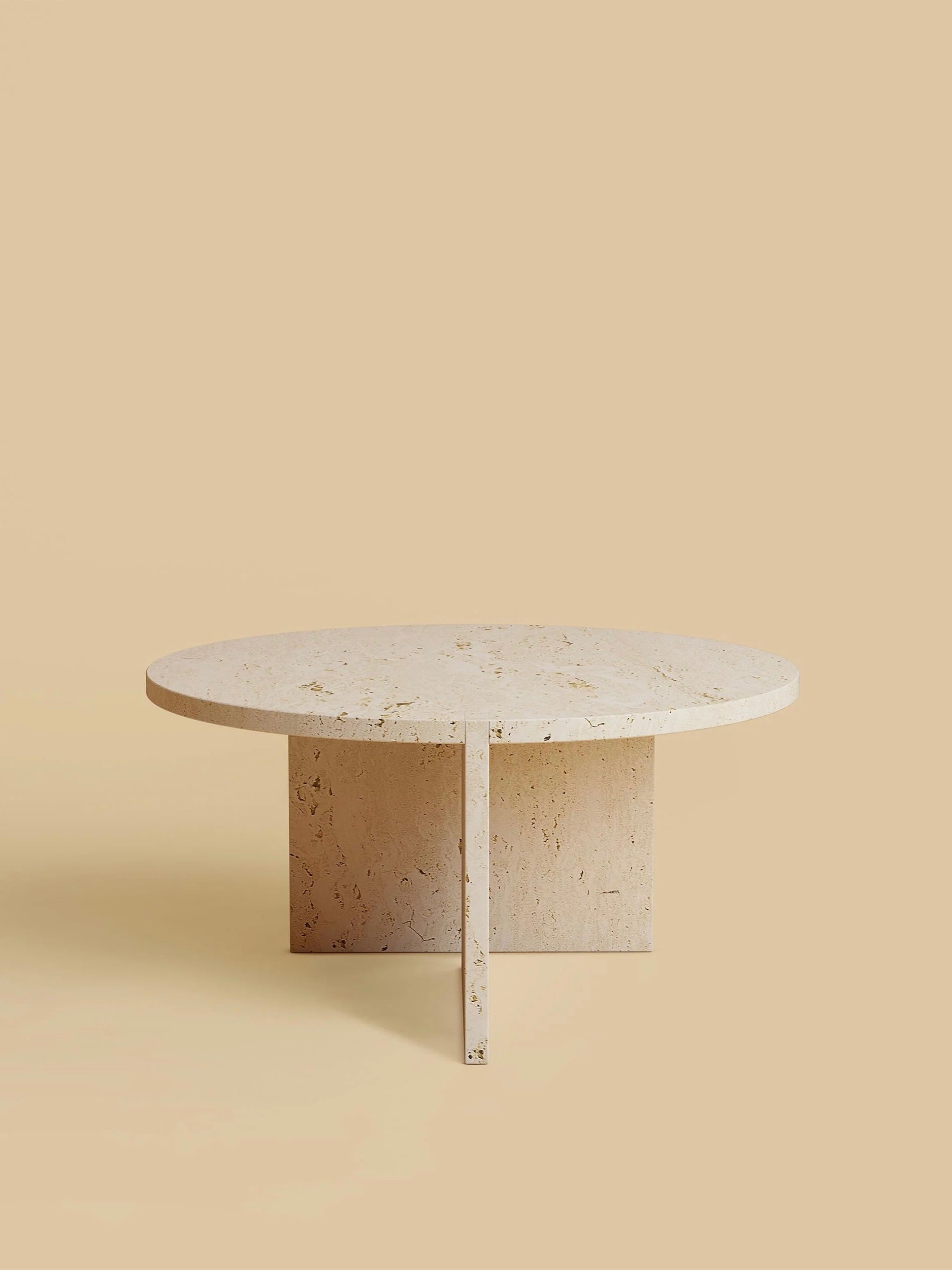 Experience the elegance of Lebanto's "Hashi" Coffee Table in Marble with its light beige, textured surface and matching backdrop. The sturdy, modern design with a T-shaped base perfectly balances style and function for contemporary spaces.