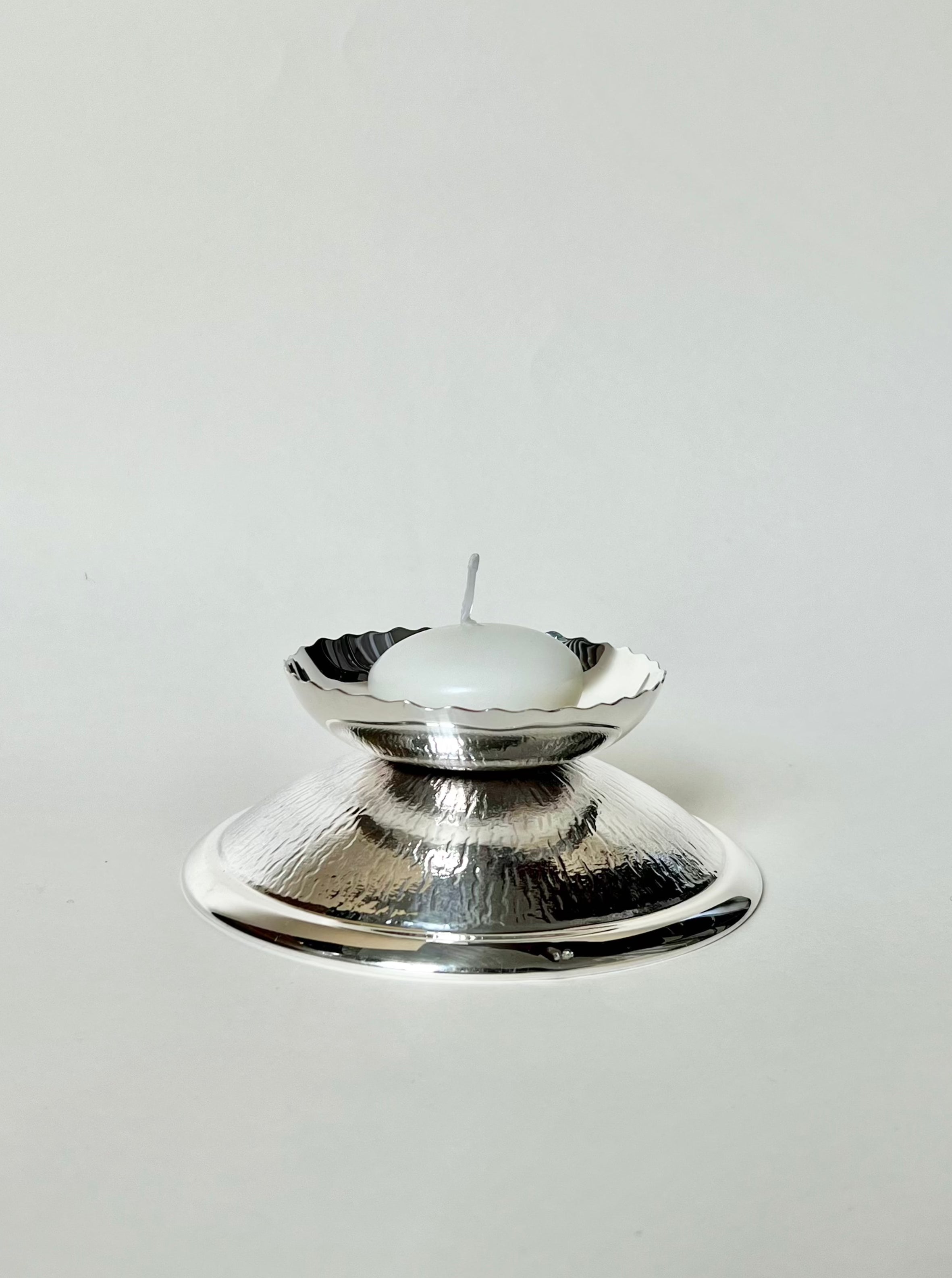 Handcrafted 925 silver candle holder base with intricate detailing and polished finish