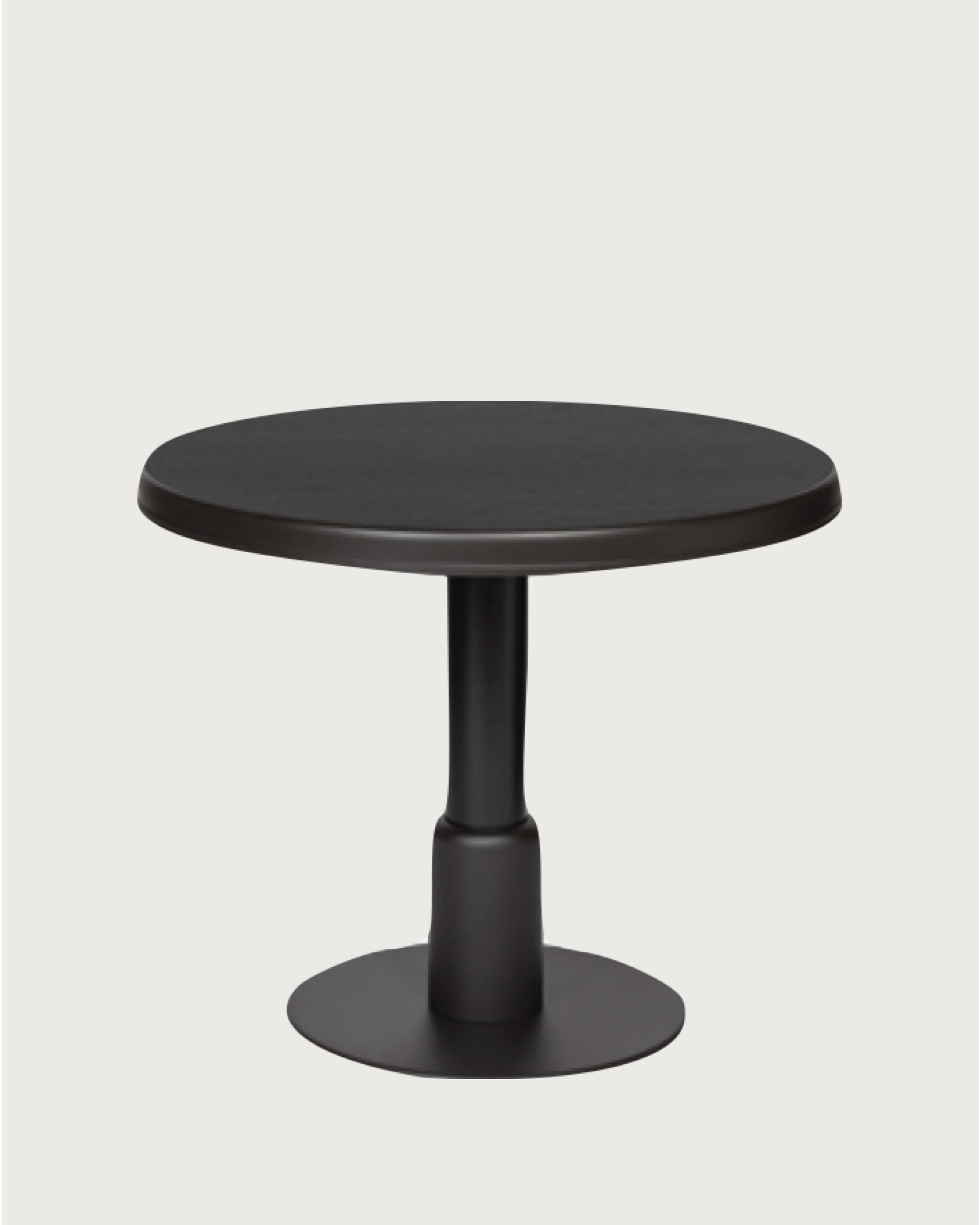 Round black pedestal dining table by Giobagnara