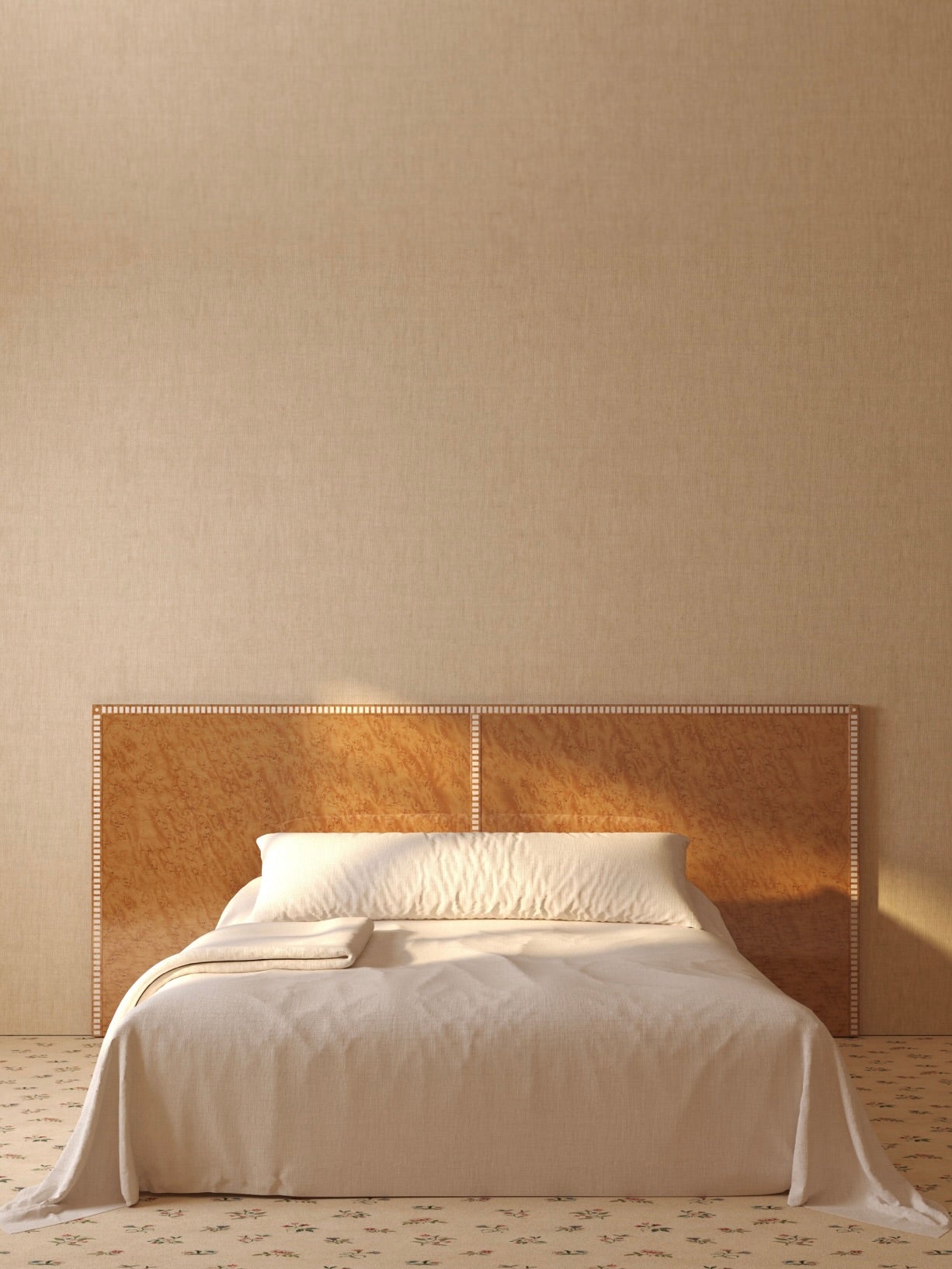 A minimalist bedroom featuring a large bed with the luxurious "Aquarama" Headboard in Birds Eye Maple by Lemon, adorned with mother-of-pearl inlays, set against a beige wall. The bed is neatly made with cream-colored sheets and pillows. The room has a beige carpet with a subtle floral pattern, creating a serene and calming atmosphere.