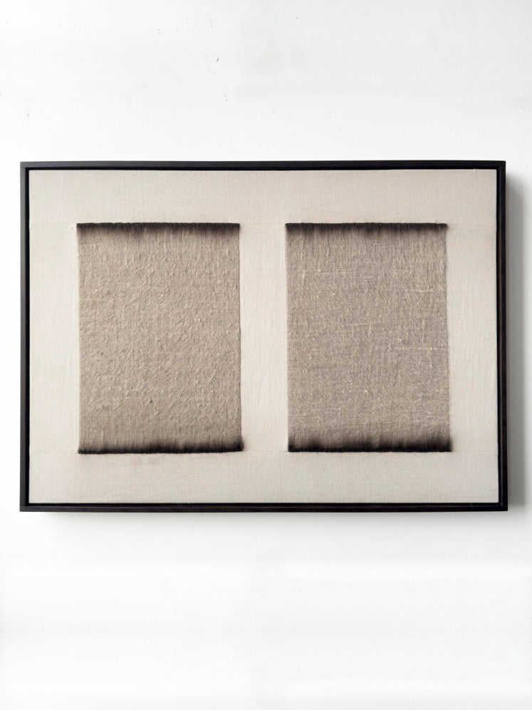 The "Twin", 2025 by Bec Kirby is a minimalist piece featuring a solid oak rectangular frame with two textured cotton linen squares in neutral tones on a plain, light background, offering simple elegance.