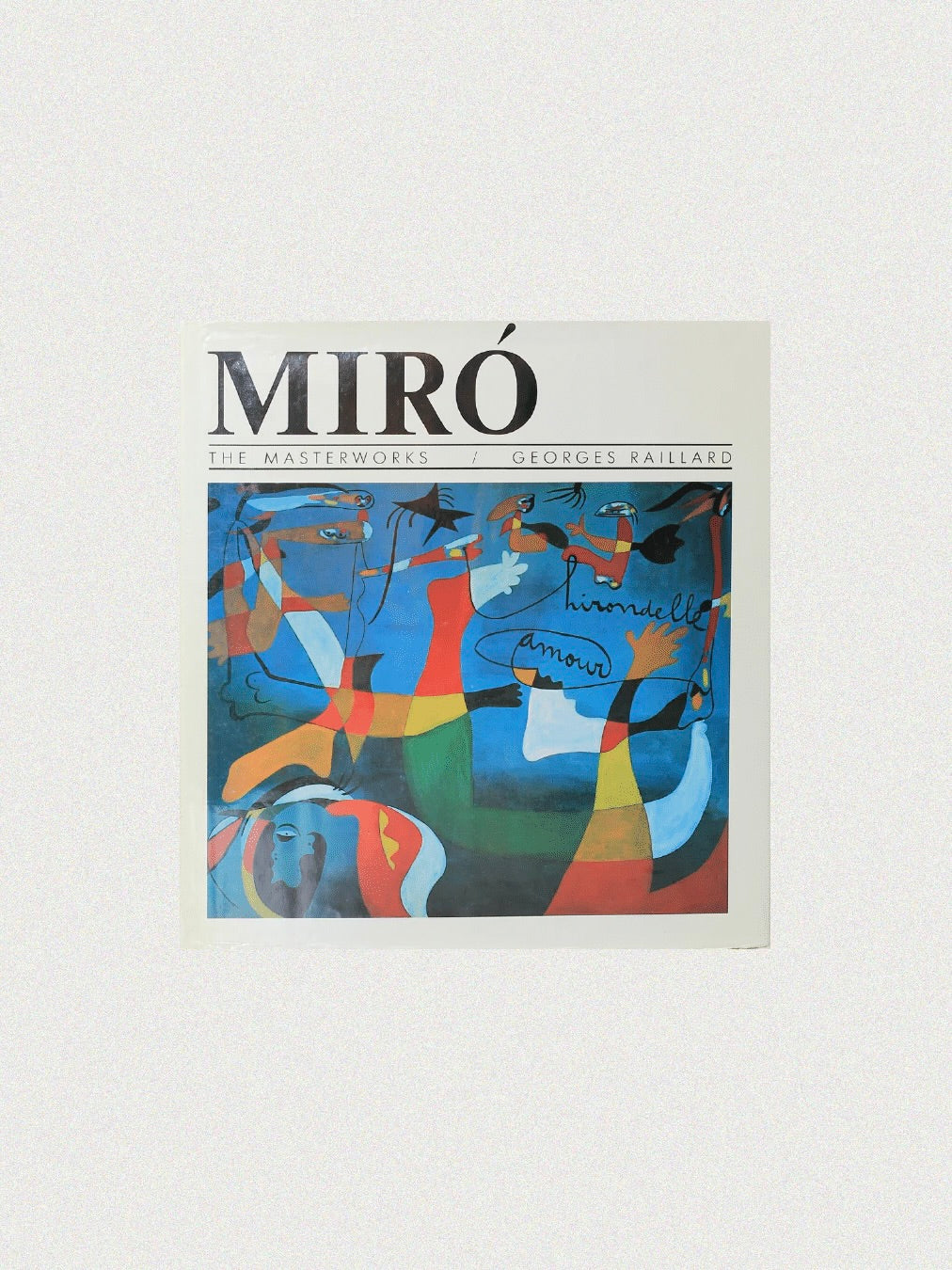 The Mirò The Masterworks Book, available at Boga Avante Shop, celebrates Joan Miró's modern art with a cover of abstract designs in blue, red, green, yellow, and black. The words "hirondelle amour" flow in cursive, capturing the essence of surrealism.