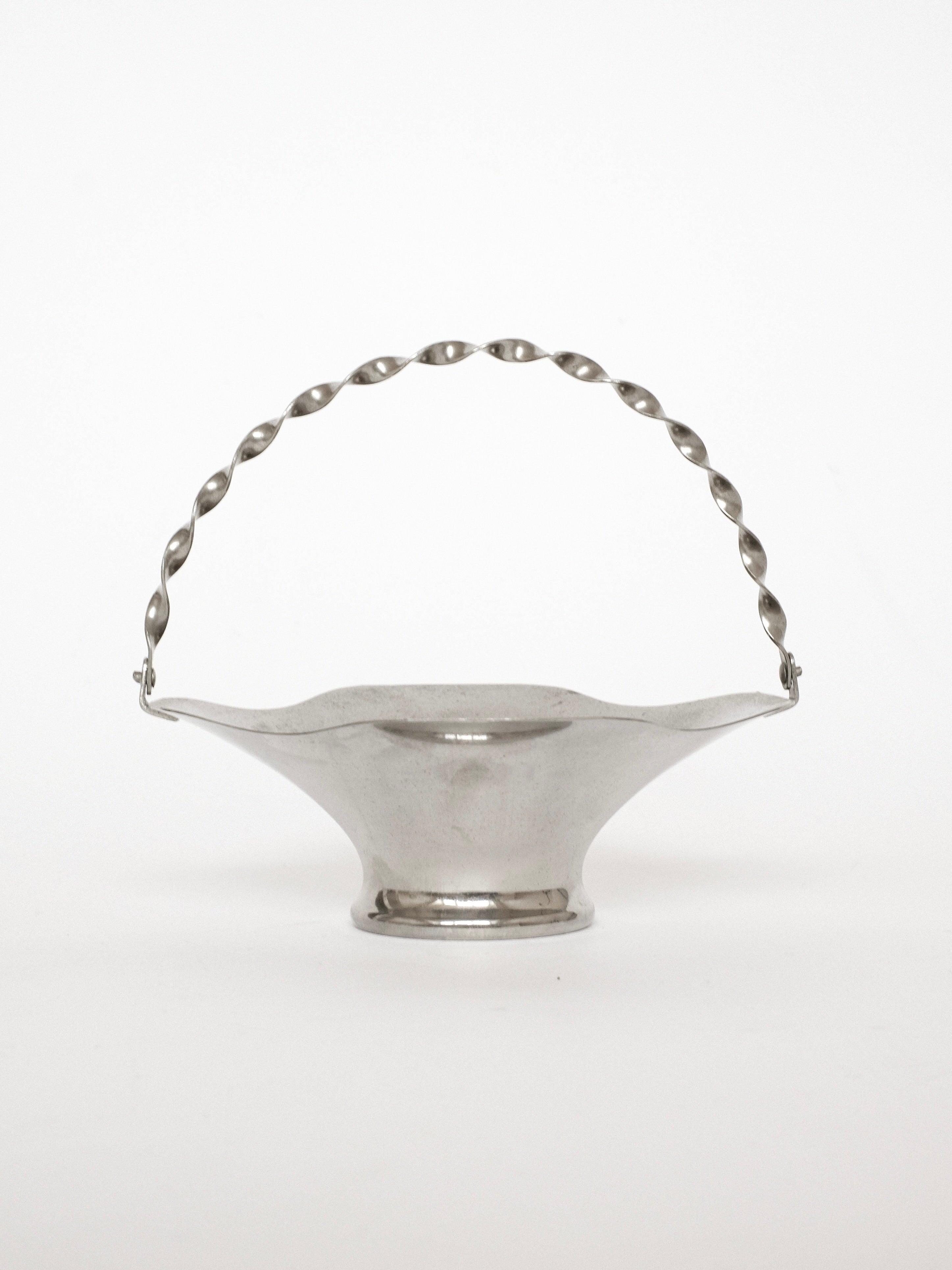 Small silver basket with twisted handle and fluted bowl base