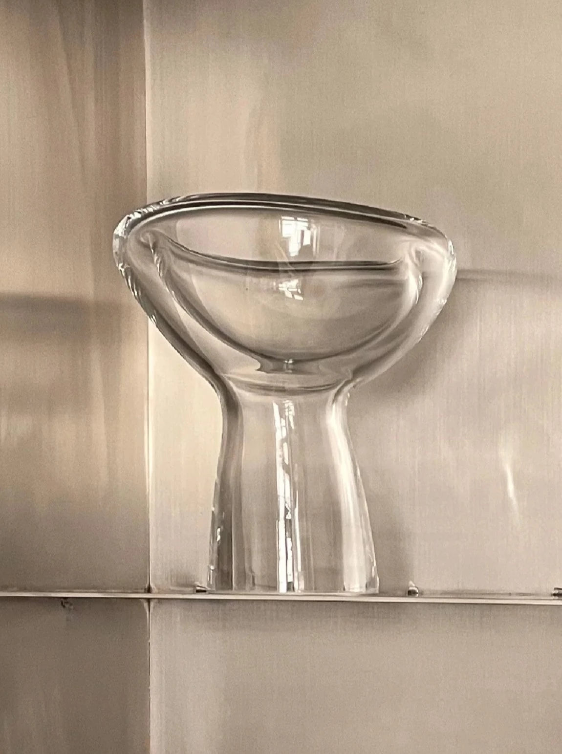 Phantom Dish Crystal shining on dining table with elegant design and reflections