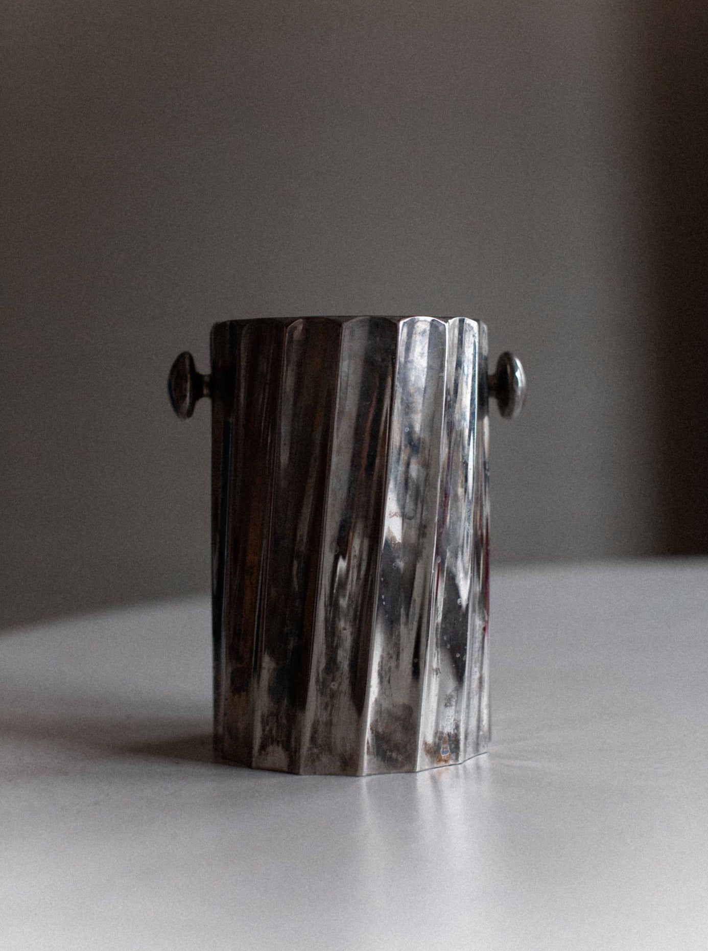 Vintage wine-cooler with brass handles and intricate floral designs