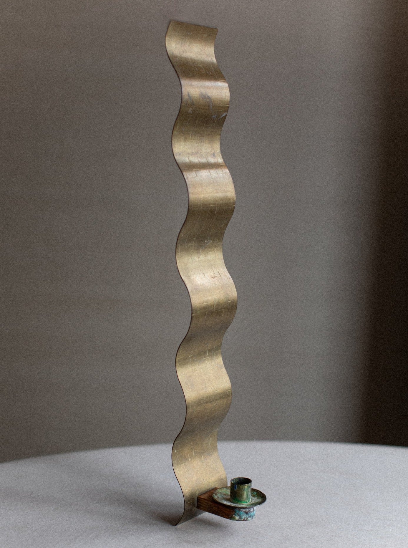 Vintage Pierre Forsell Sconce with brass finish and sleek design