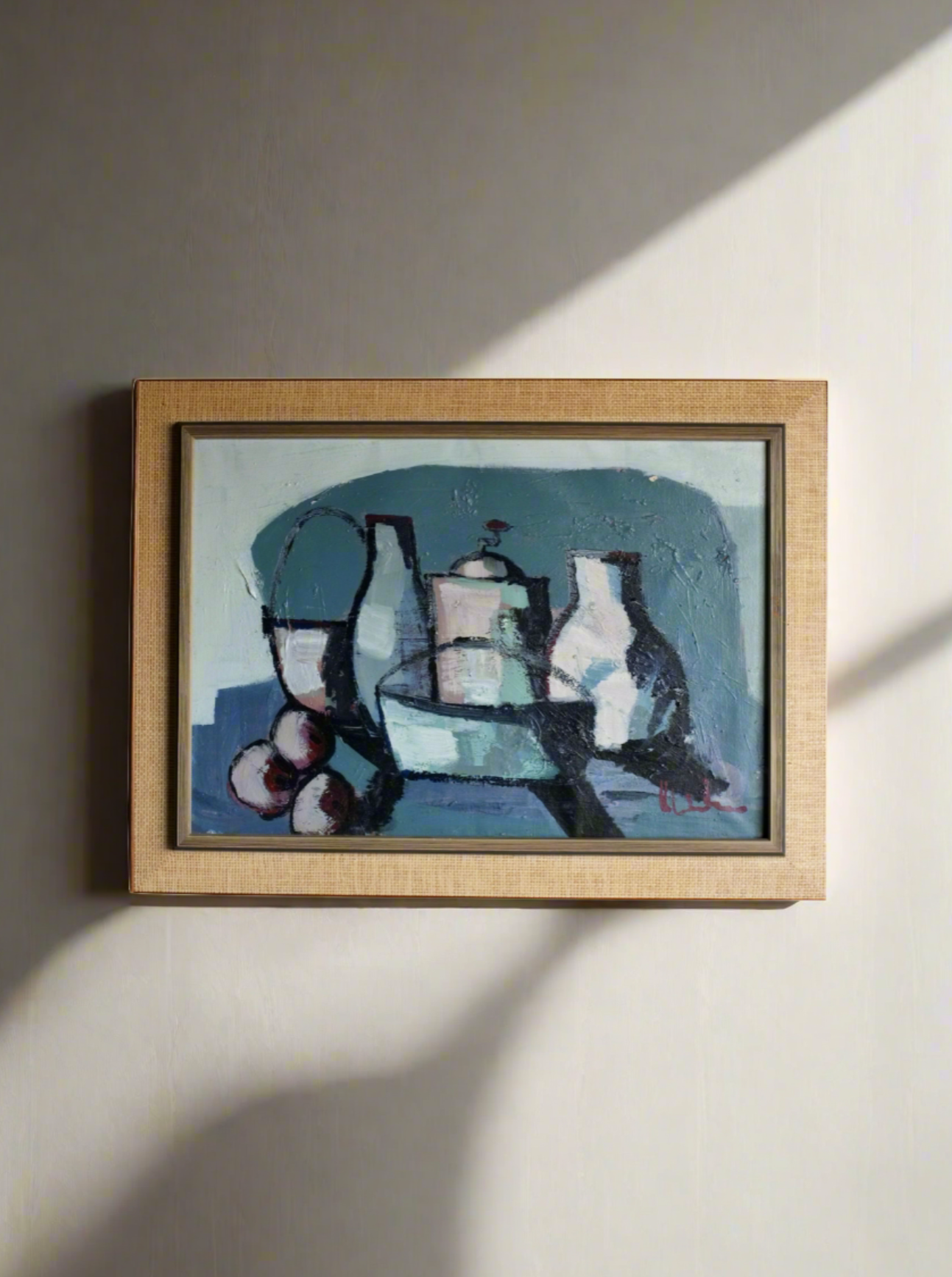 The Veter Vintage Vintage Still Life Painting in Blue Hues | Oil on Canvas is framed and showcases a vintage still life composition. The artwork features various objects, including a pitcher, bowl, and three round fruits, rendered in abstract forms with a predominantly blue color palette. The frame is a light wood tone, reminiscent of European art.
