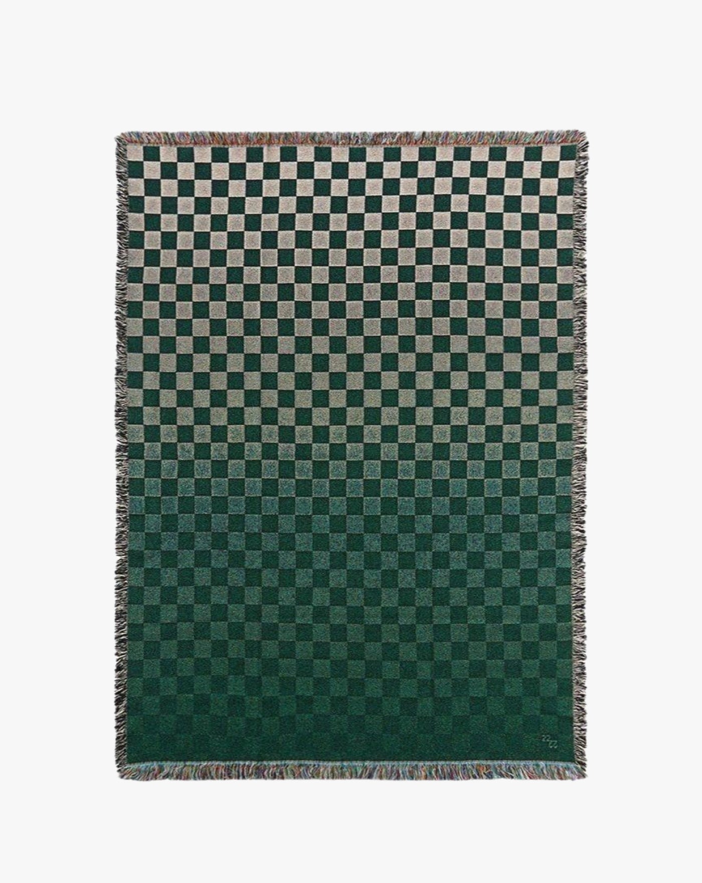 A Tori Jacquard Throw by 2222Studio with a green shaded square pattern and darker edges, along with a fringed border, giving it a textured appearance. The design features a gradient effect, darkening towards the bottom. This piece is part of 2222Studio's collection.
