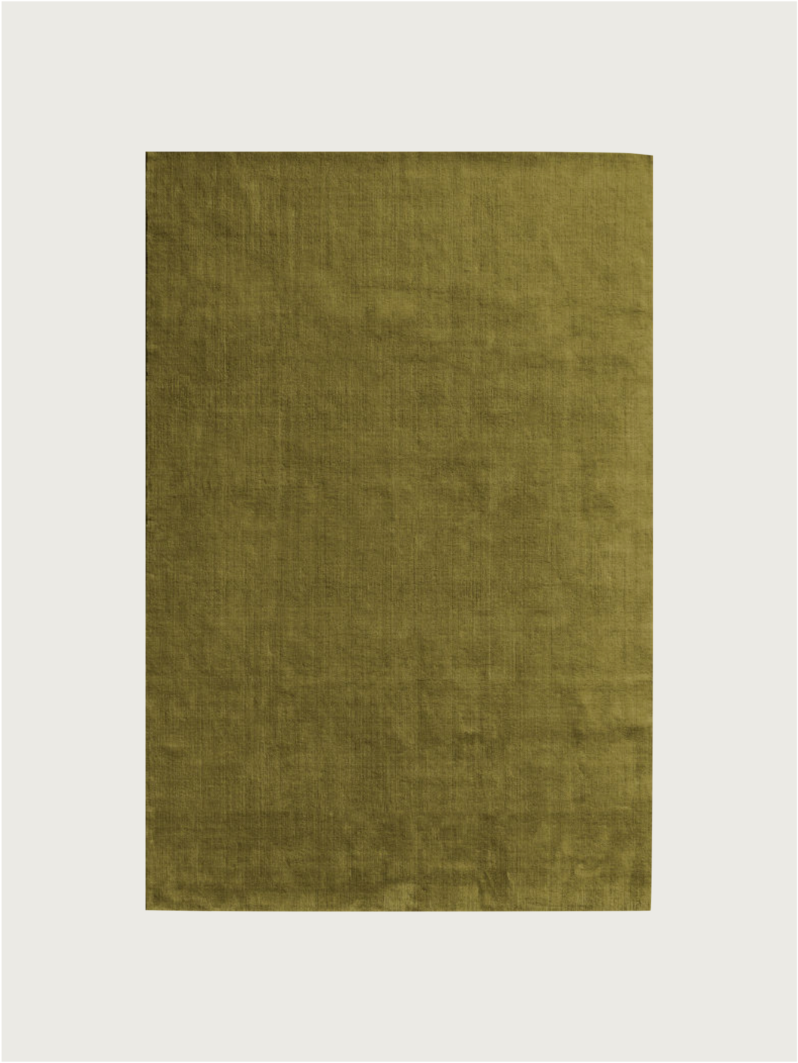 A rectangular olive green hand-woven rug in New Zealand wool by MOST, featuring a subtle textured pattern and exceptional durability, is centered on a plain white background with a thin black border.