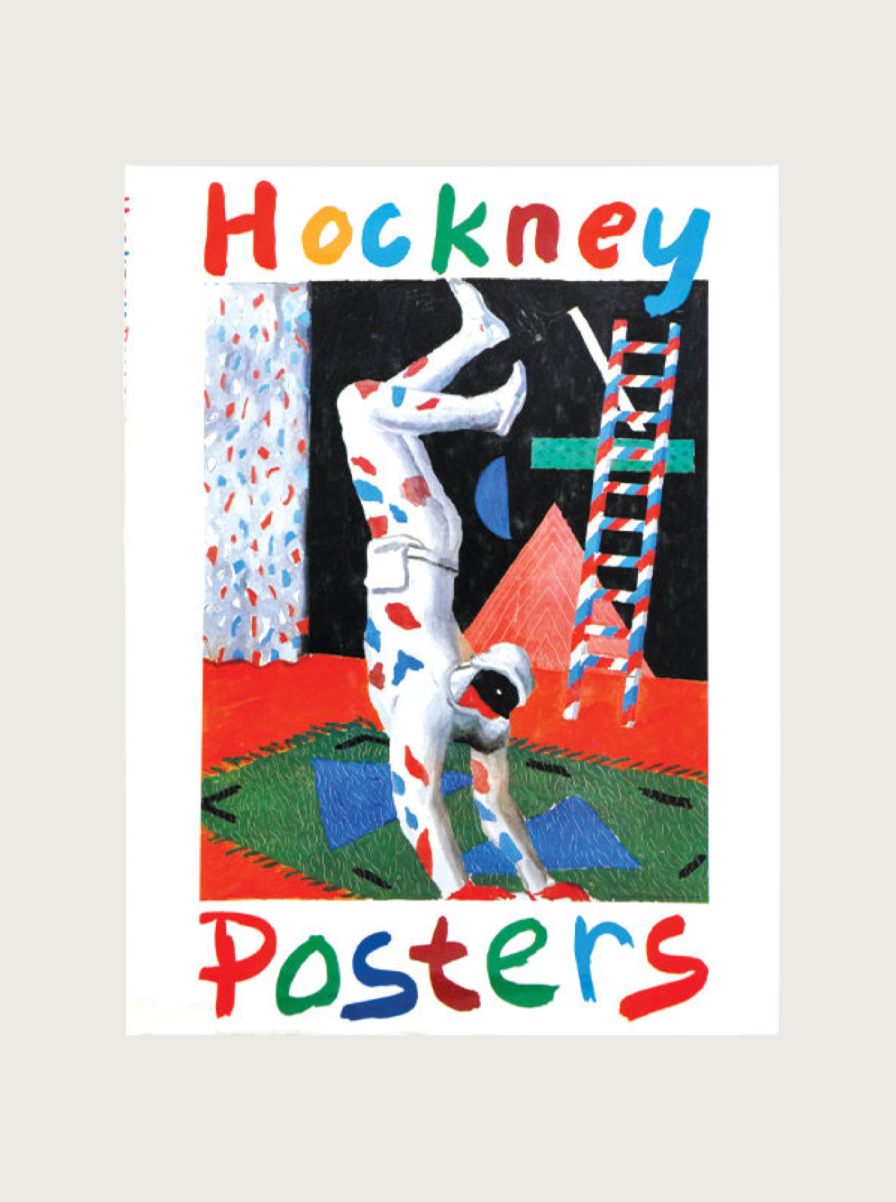 The cover of "Hockney Posters by David Hockney," a book from Maison Plage, features a vibrant illustration of an astronaut performing a handstand. The background is adorned with abstract, multicolored patterns and shapes. The title, echoing the playful style characteristic of Hockney's renowned works, is written in colorful, whimsical letters at the top and bottom of the cover.