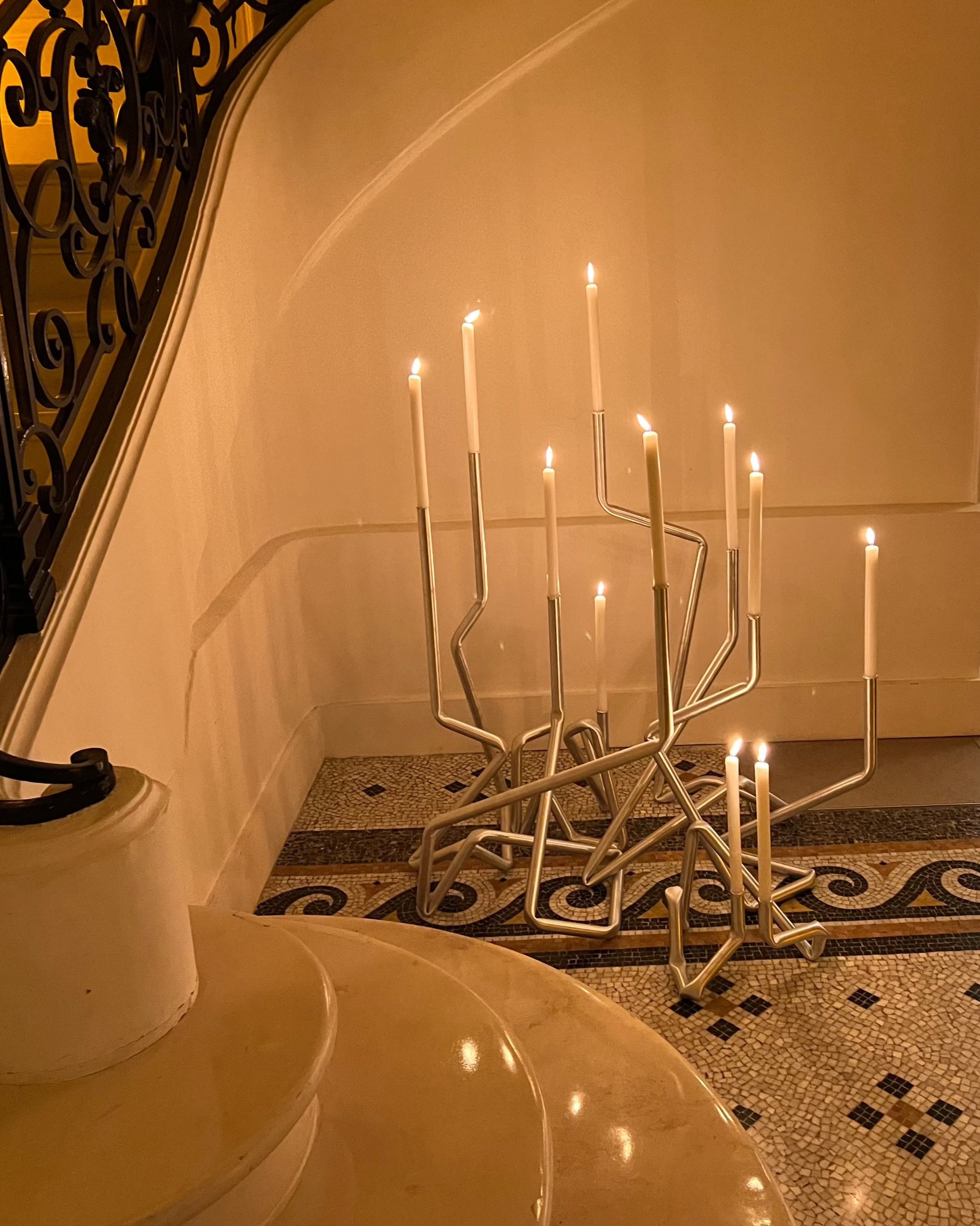 Spaghettoni (8-Armed Candelabra) with intricate wrought iron design and polished bronze finish
