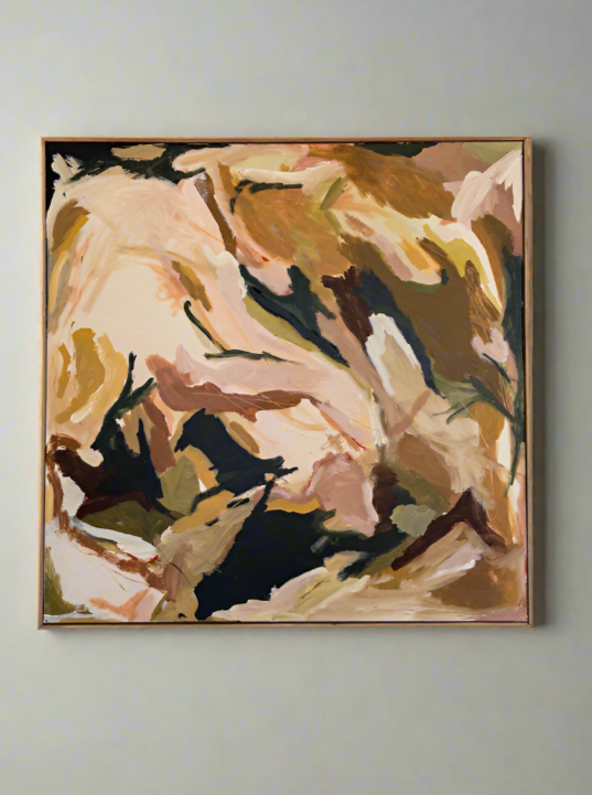 A framed Agapitós - Painting by Natasha France featuring a mix of earthy tones, including shades of brown, beige, black, and hints of white. The brushstrokes create a dynamic composition with an impression of natural forms and flowing movements. This original piece of art is mounted on a light-colored wall.
