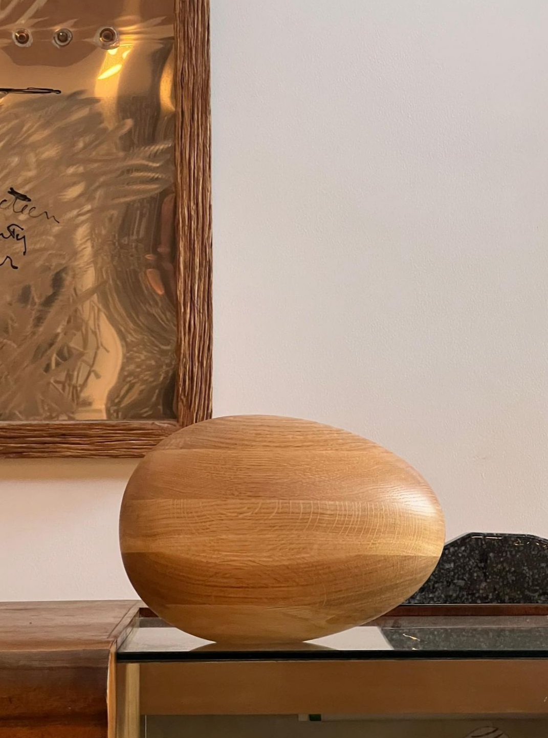 Natural Oak Egg Sculpture displayed on a white background with soft lighting, highlighting its smooth and organic shape, perfect for adding a touch of nature to any space