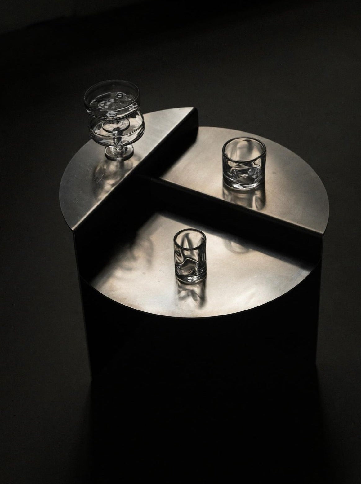 Rivet Side Table made of durable and sleek aluminum material