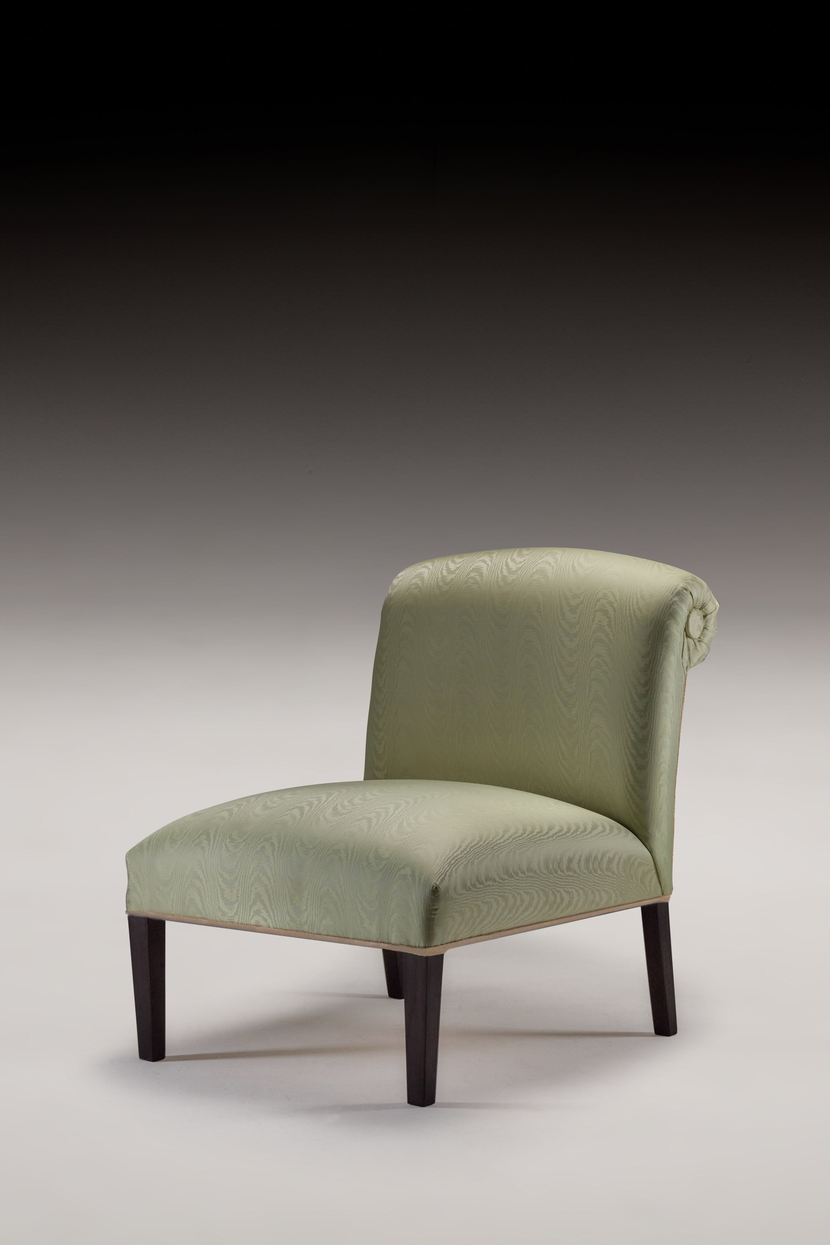 HESTIA SLIPPER CHAIR — close-up of green upholstered fabric texture
