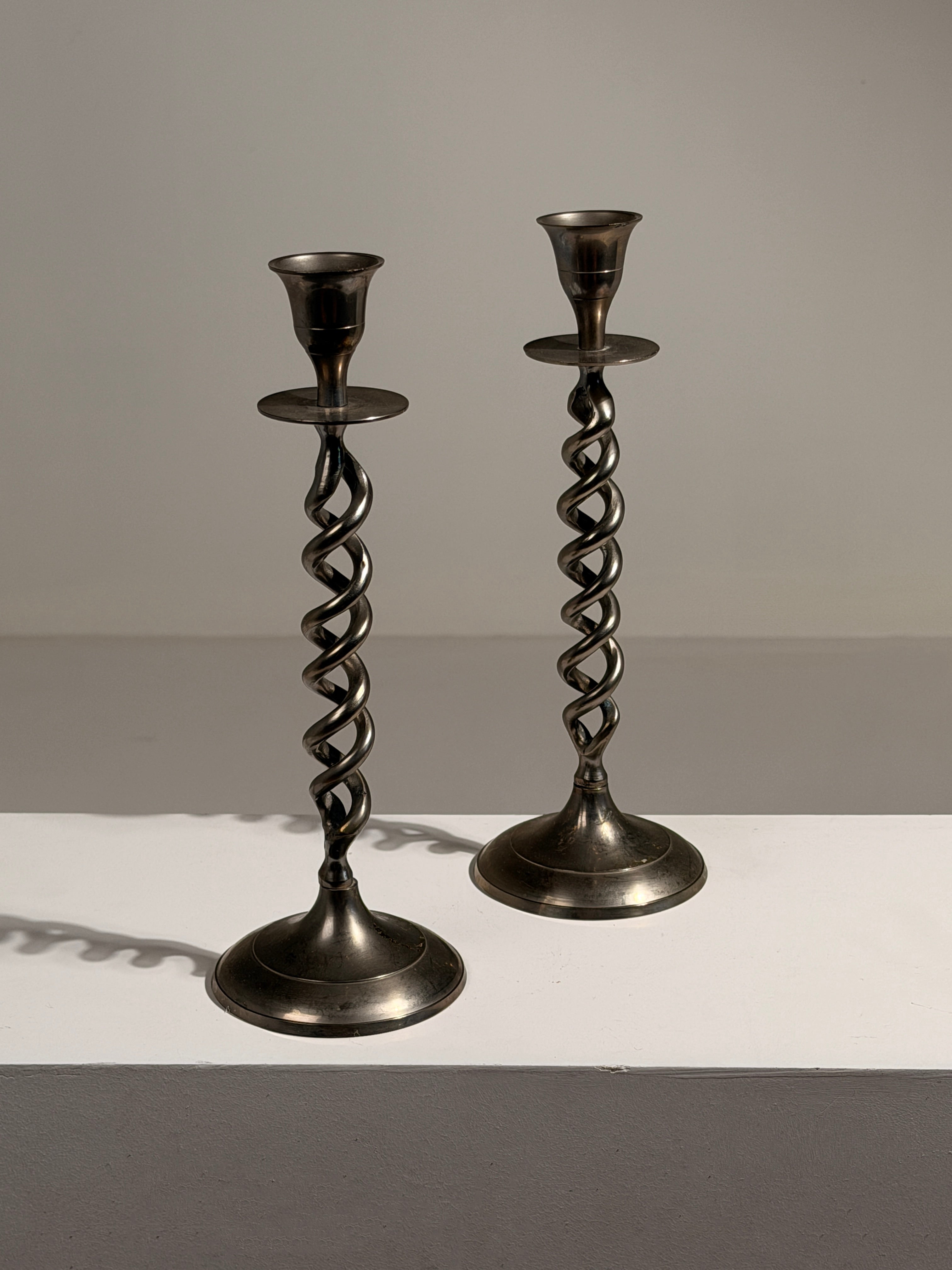 Pair of Art Deco style candlesticks — side angle