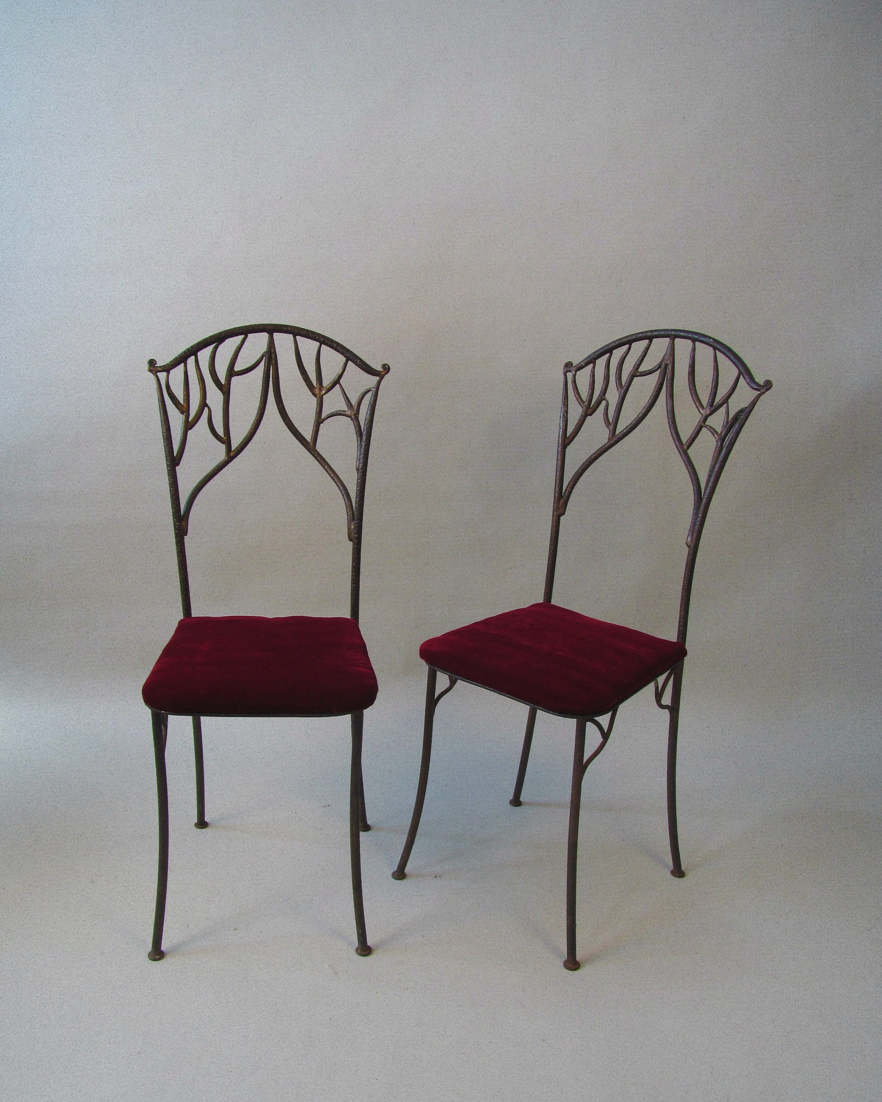 Fer Forgé Dining Chairs (Pair) by Myakin | The Oblist — wrought iron, burgundy upholstery