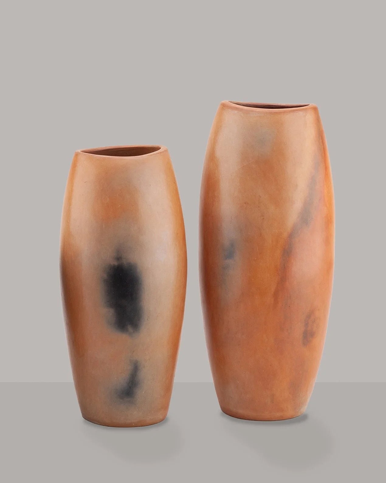 A pair of burnished earthenware decorative vessels by RELIC LONDON | The Oblist