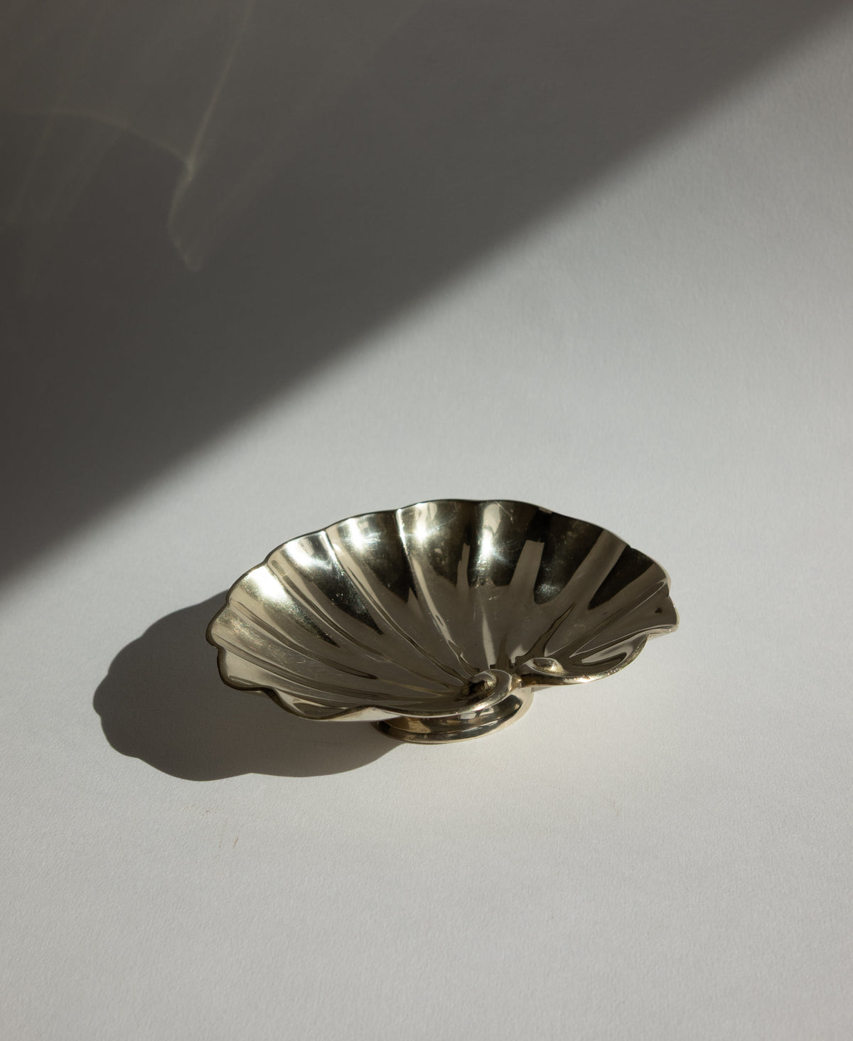 French Art Deco Polished Brass Shell Pedestal Jewelry Dish — side angle