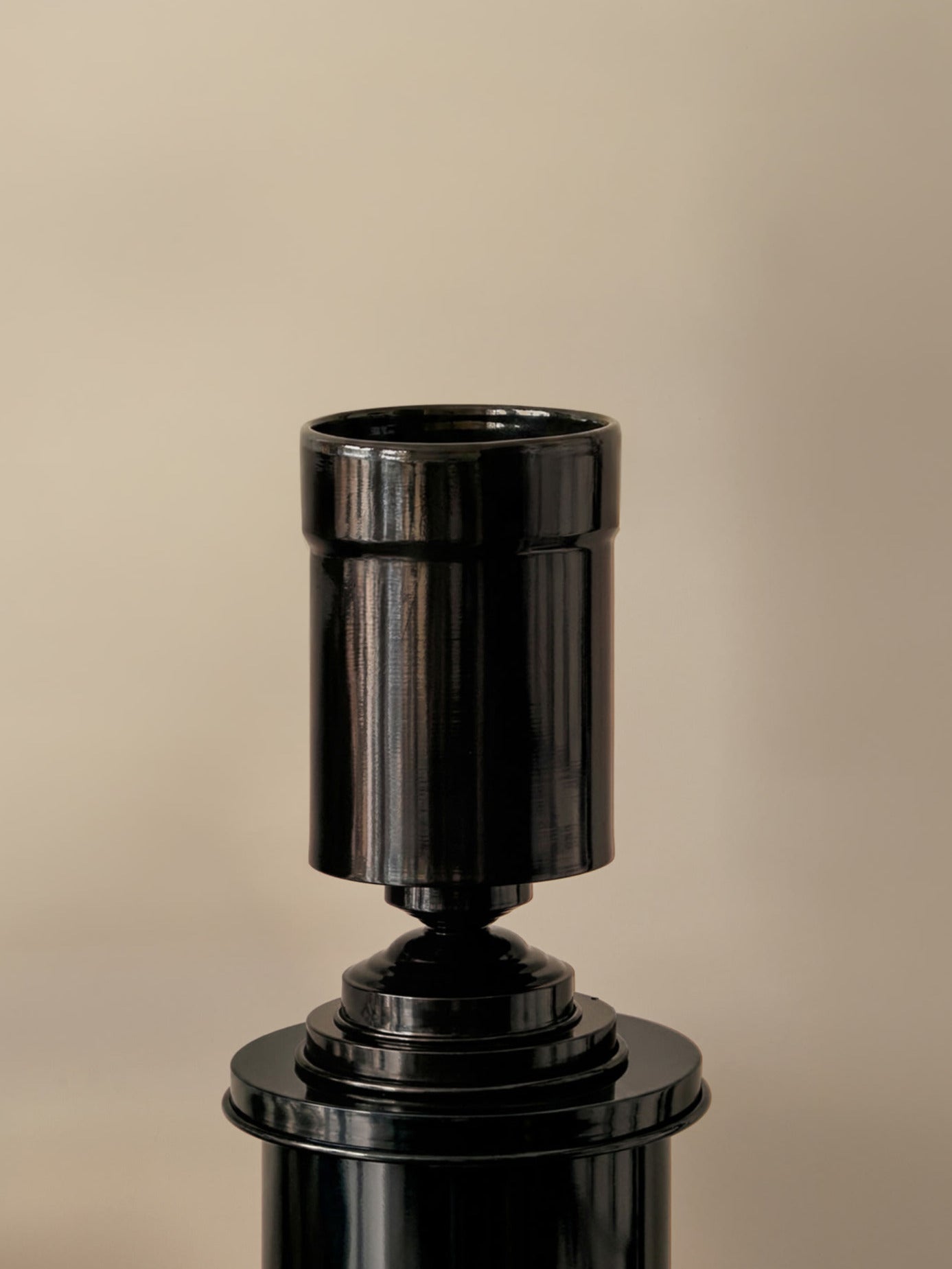 Art Deco Vase in Black glossy Metal — close-up