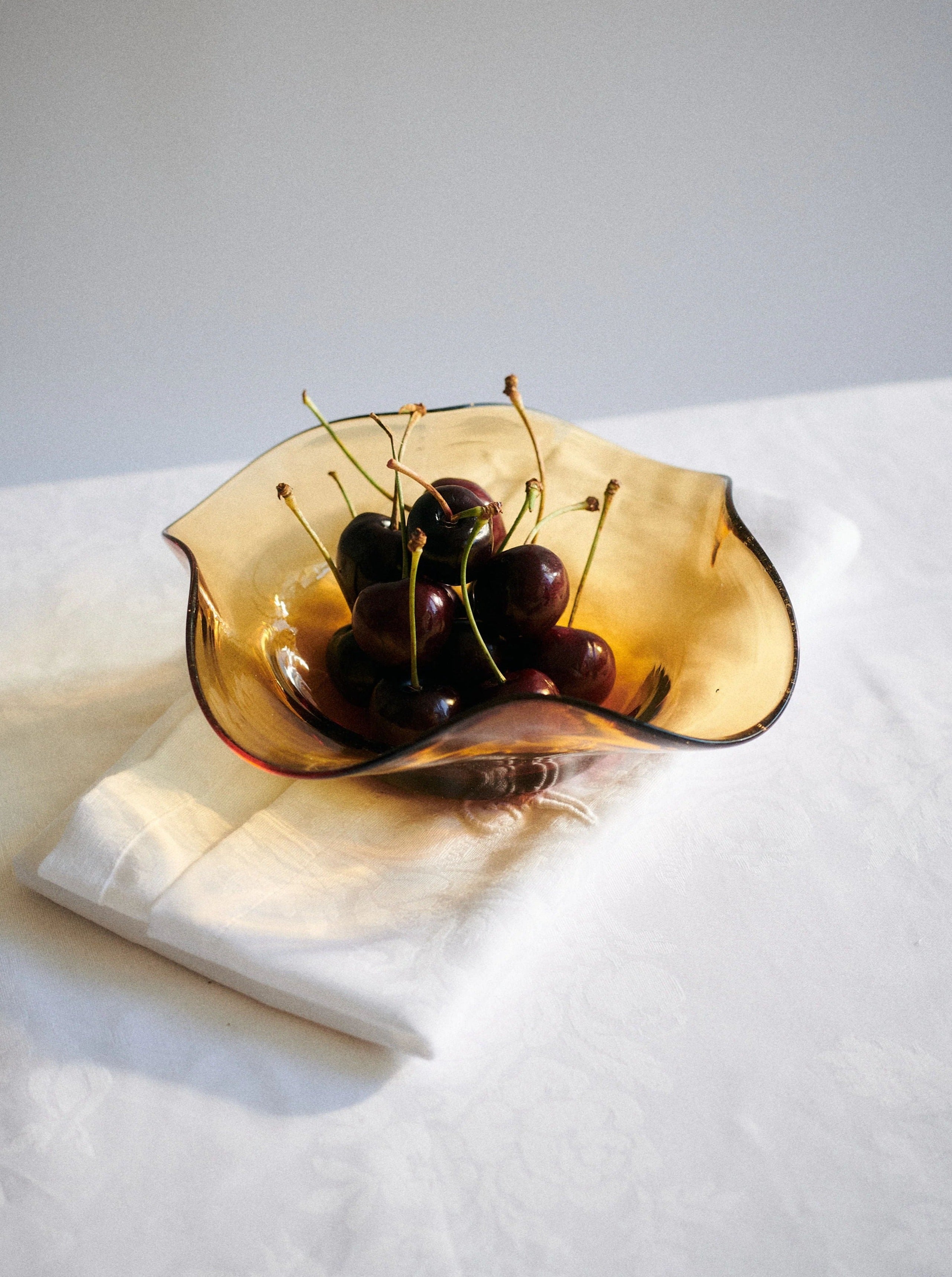 Michele Bowl Small by Akua Objects | The Oblist — amber glass, modern design