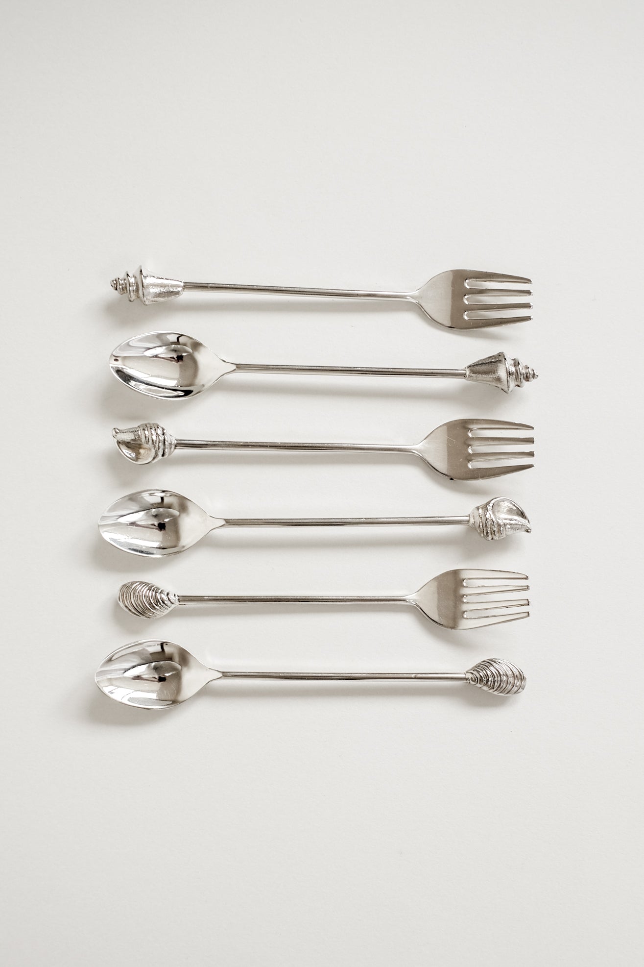 Silver-Plated Seashell Cutlery Set by septembre studios | The Oblist — silver finish, artisan design