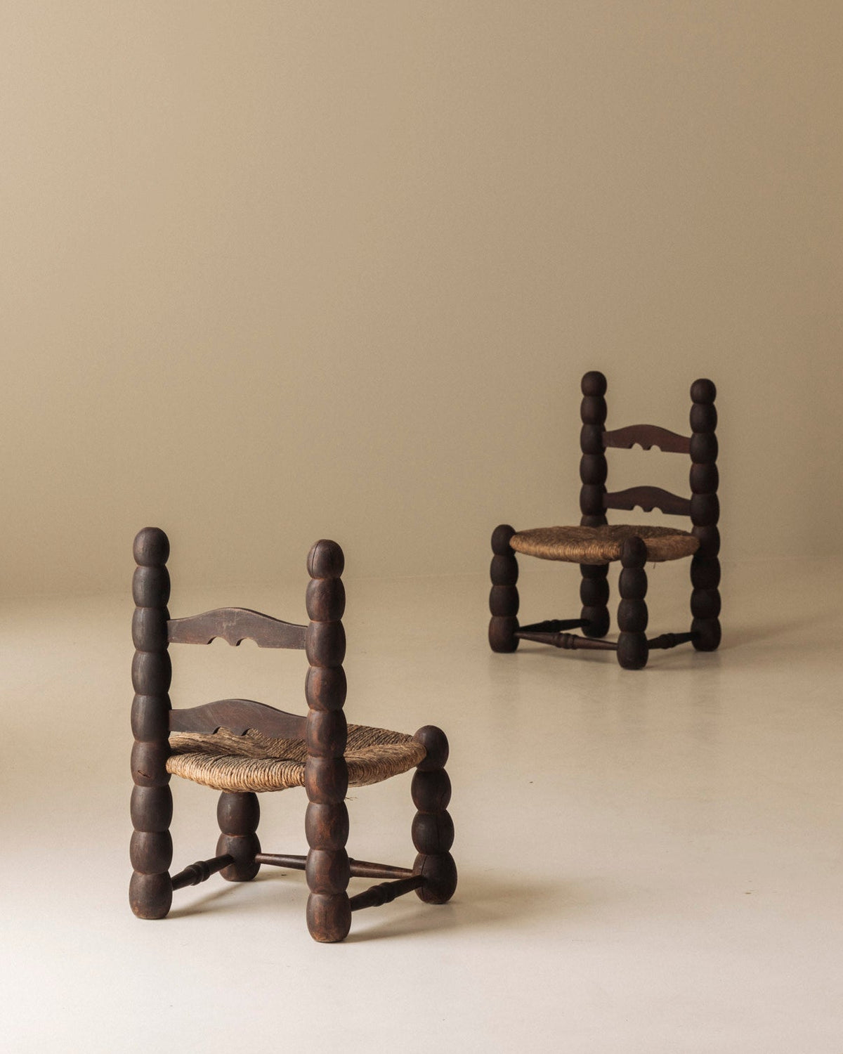 Pair of Spanish Bobbin-Turned Side Chairs with Rush Seats, Early 20th Century — detail view