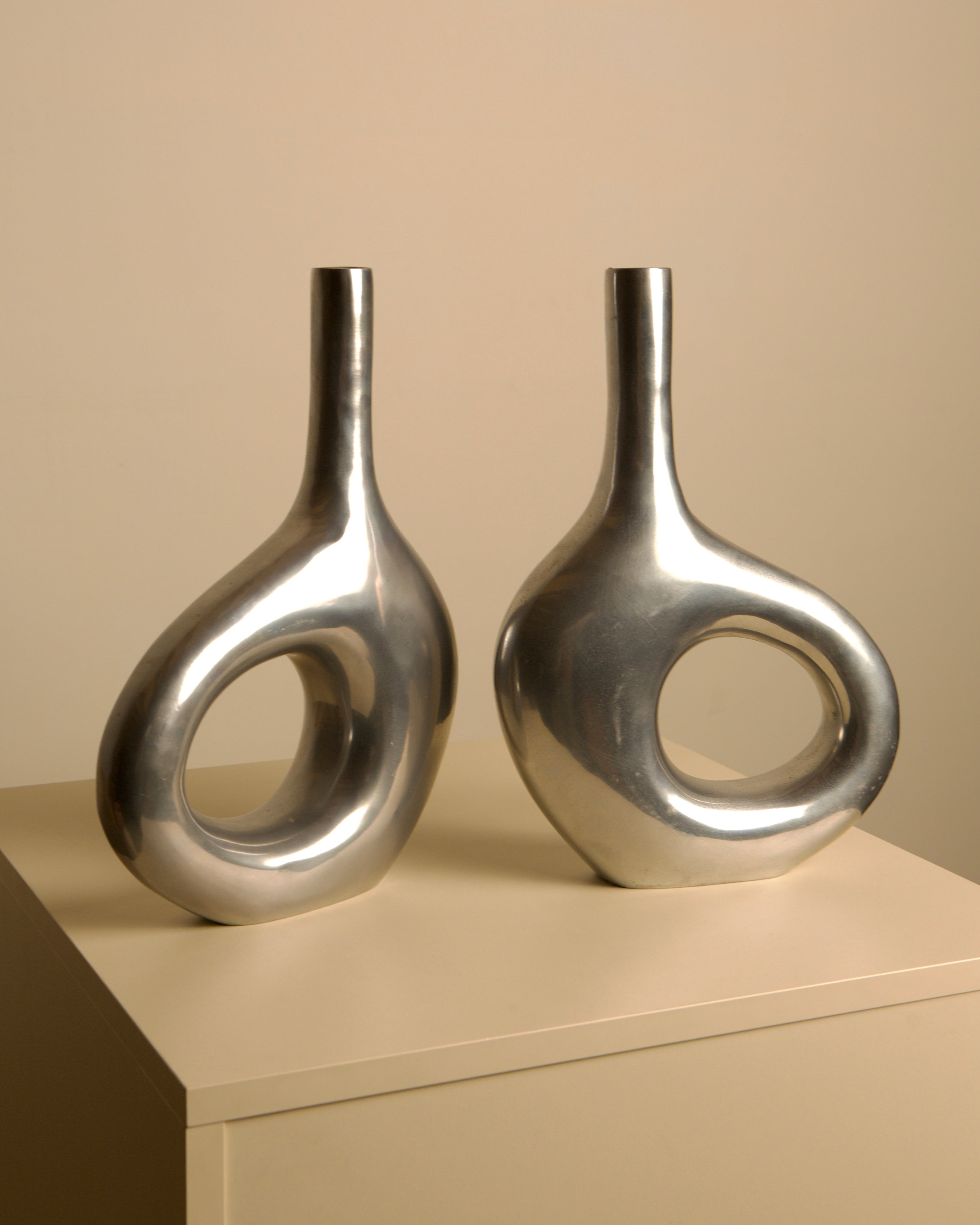 Pair of Italian cast aluminum vases from the 1980s — detail view