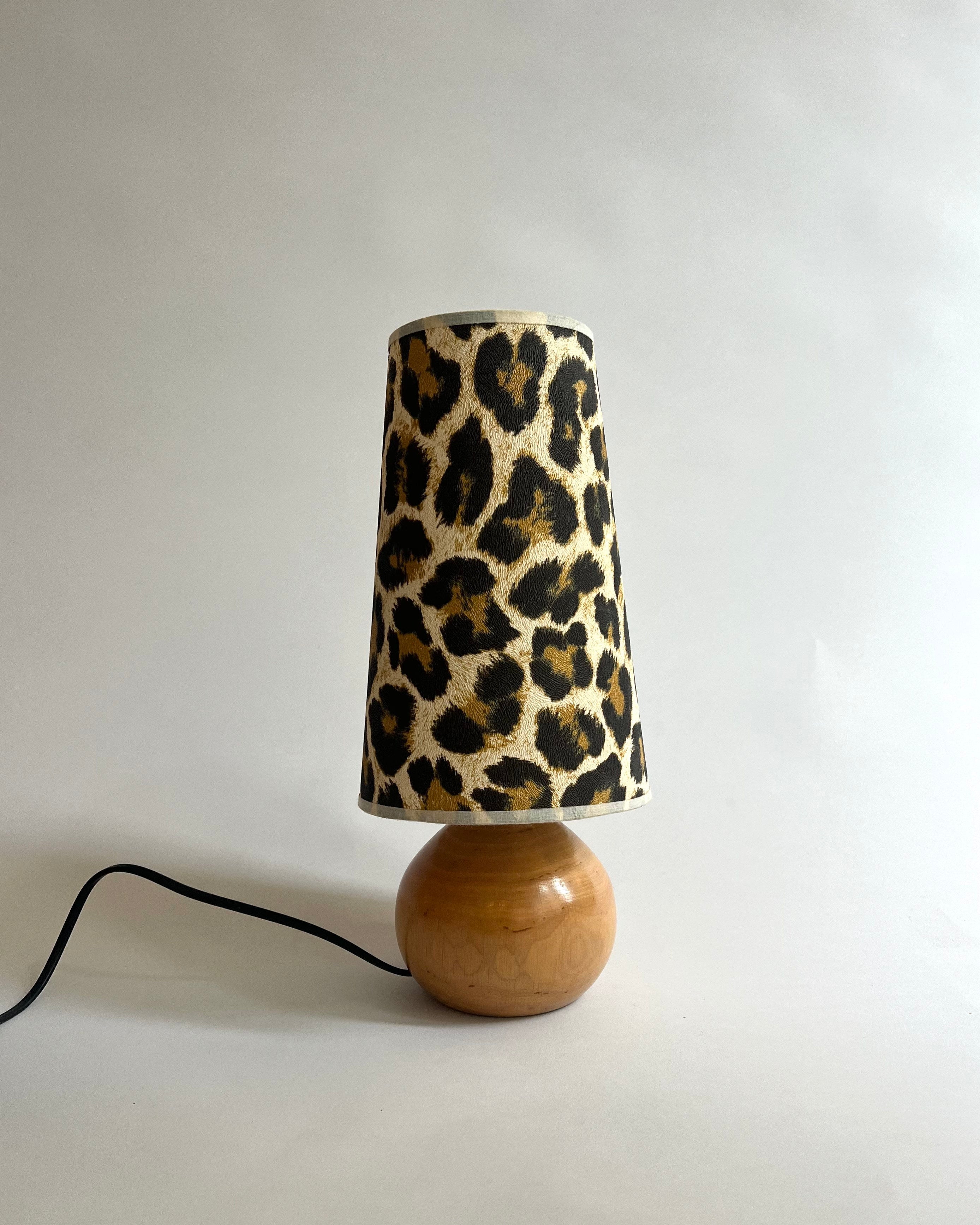 Ibiza table lamp by SÒLER | The Oblist — handcrafted wood base, leopard print shade