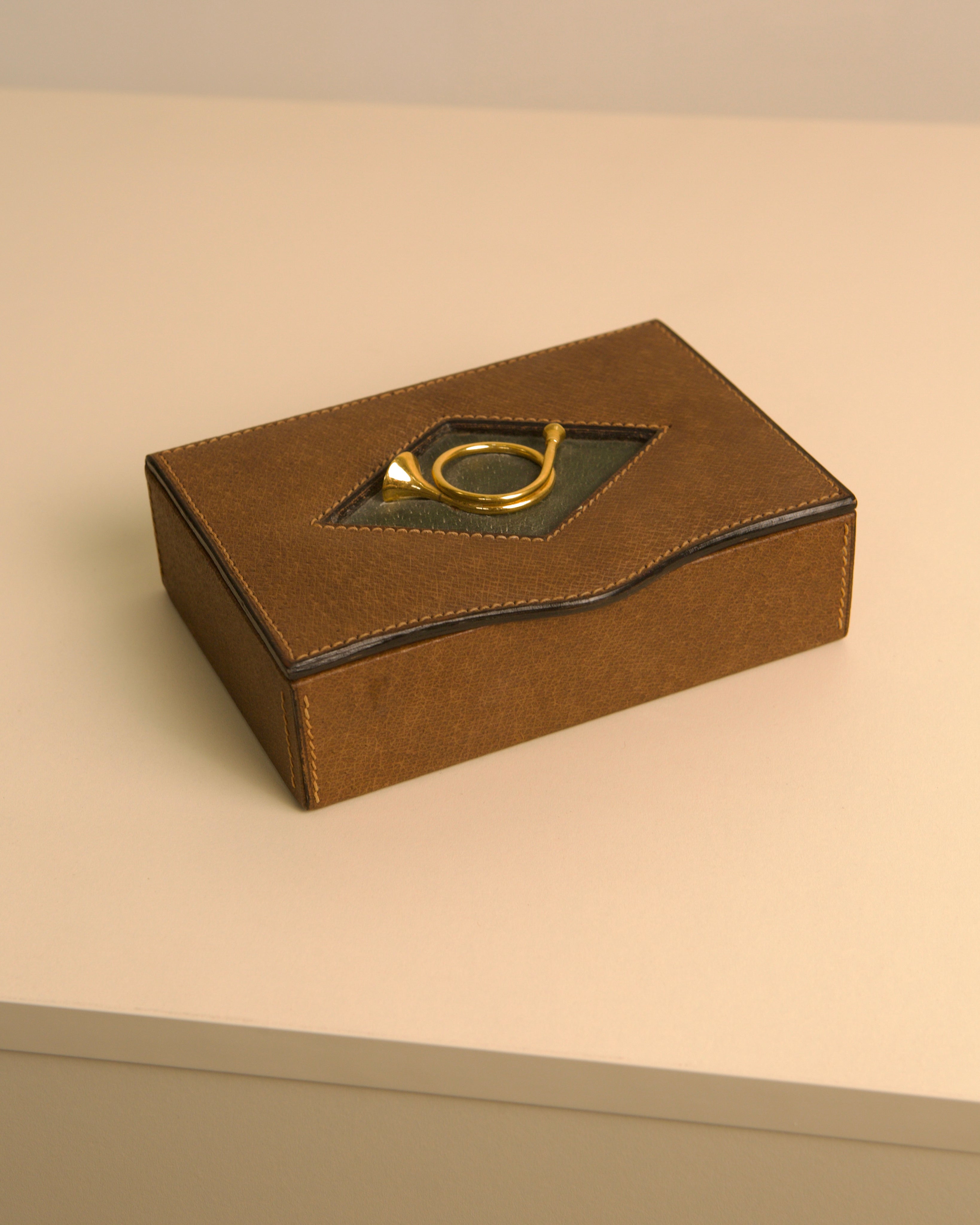 Brown leather Gucci box with gold clasp from the 1960s