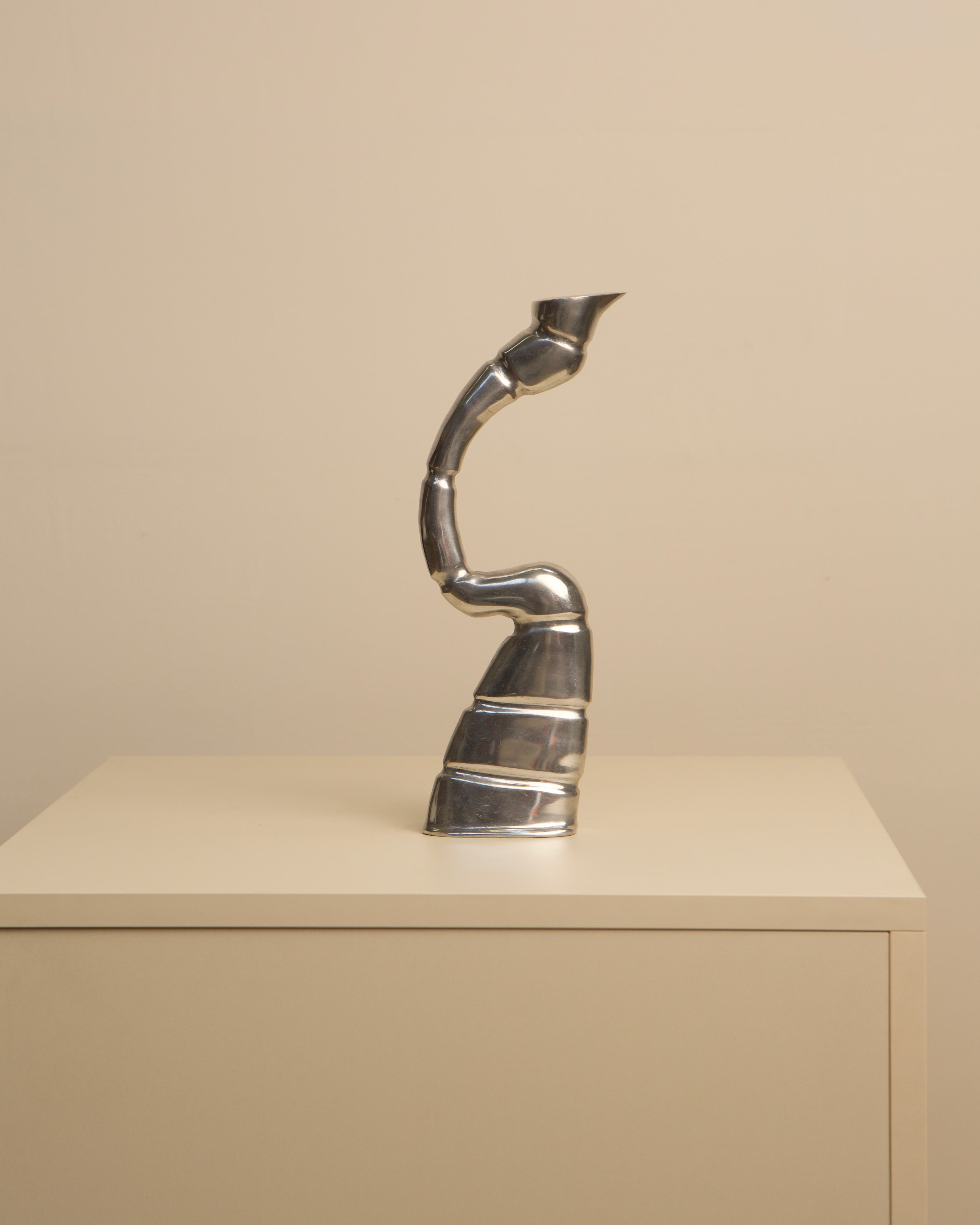 Vintage chrome Scorpion candleholder with curved sculptural design