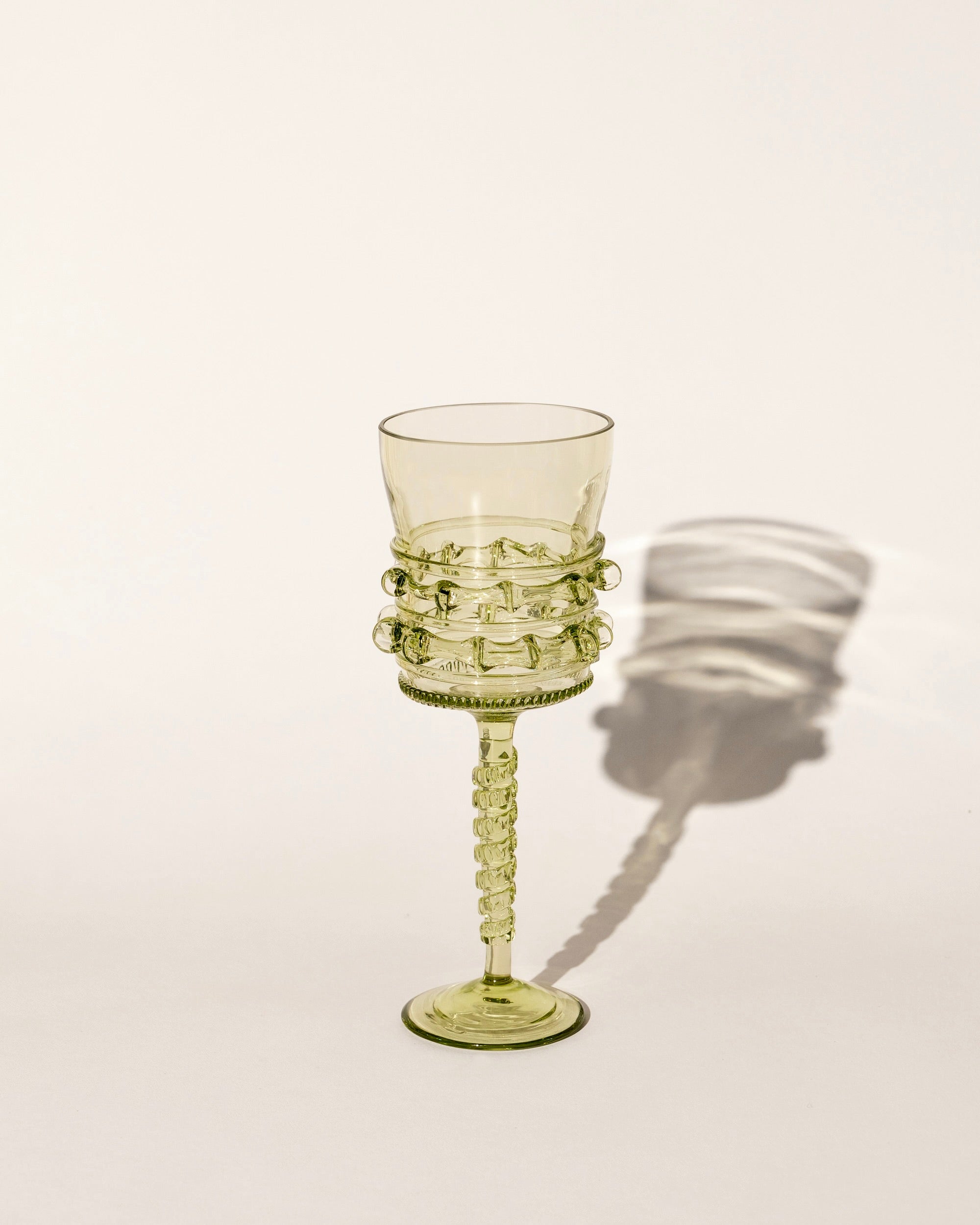 Pair of Mouthblown Wine Glass - Tall Spirals — side angle showing green glass design