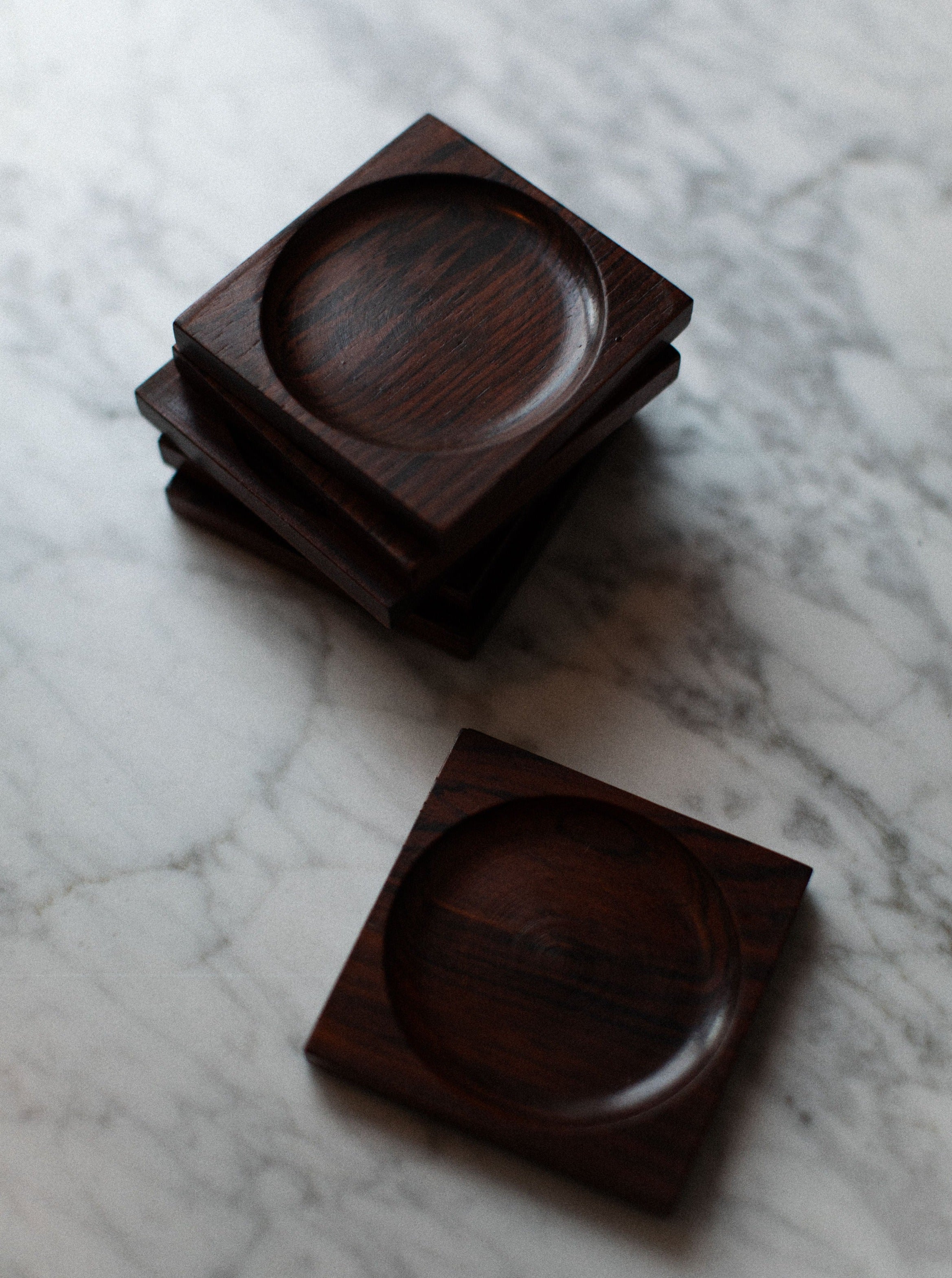 Set of 4 handmade wooden coasters with intricate leaf pattern in walnut finish