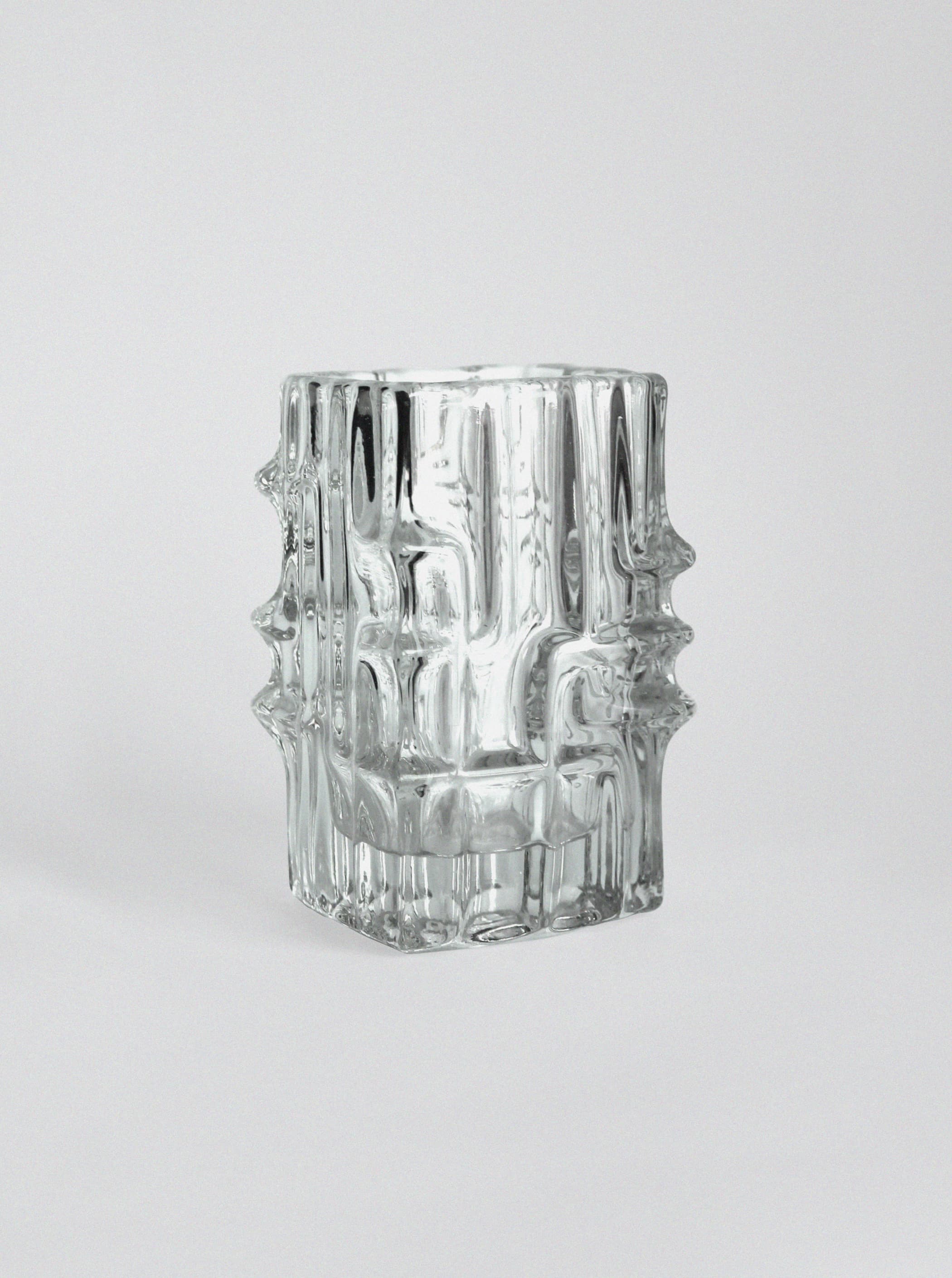Clear textured glass vase with geometric ridged pattern design