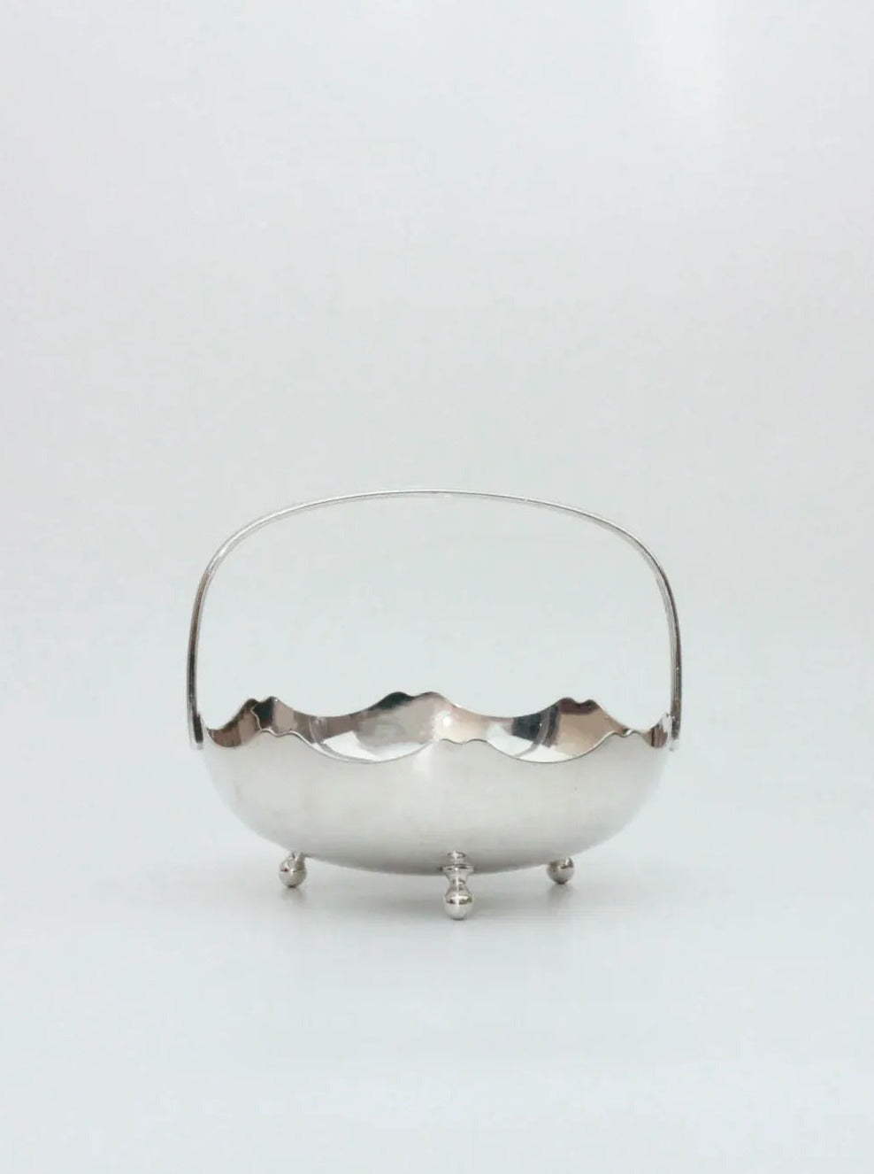 Handcrafted Silver Vintage Basket with Intricate Woven Design and Elegant Handles