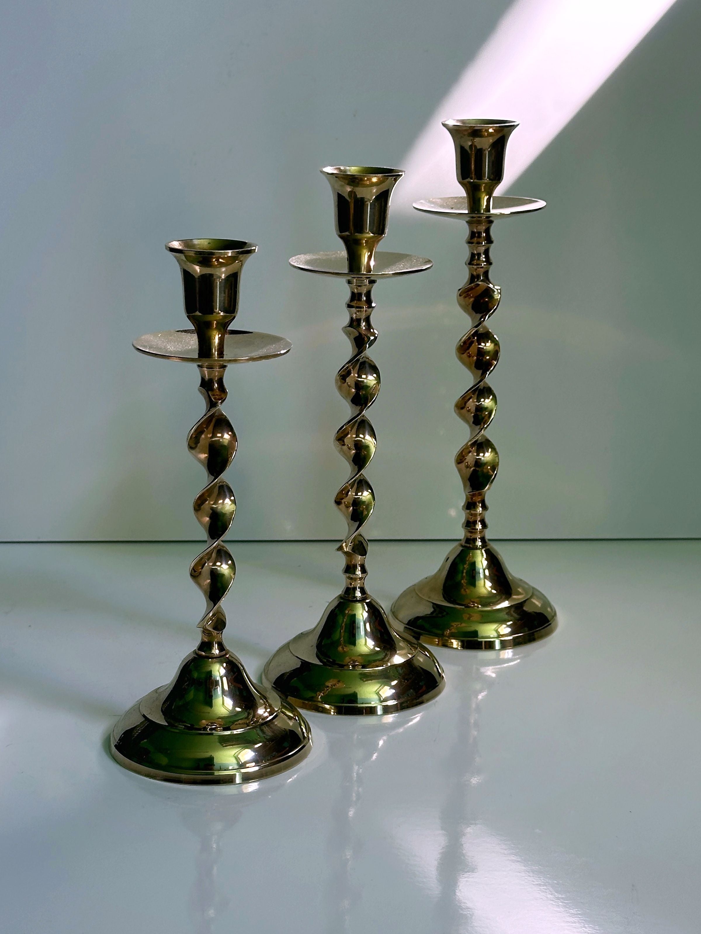 3 Candleholders Made of Polished Brass