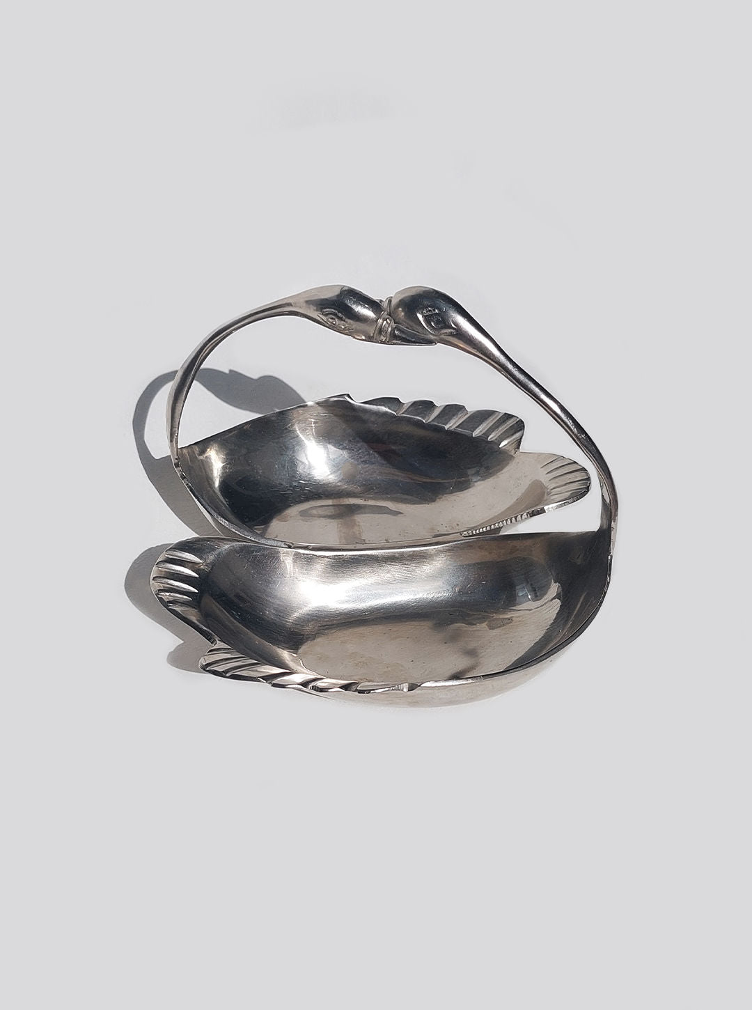 Swan Brass Vide Poche to store keys and trinkets on a table