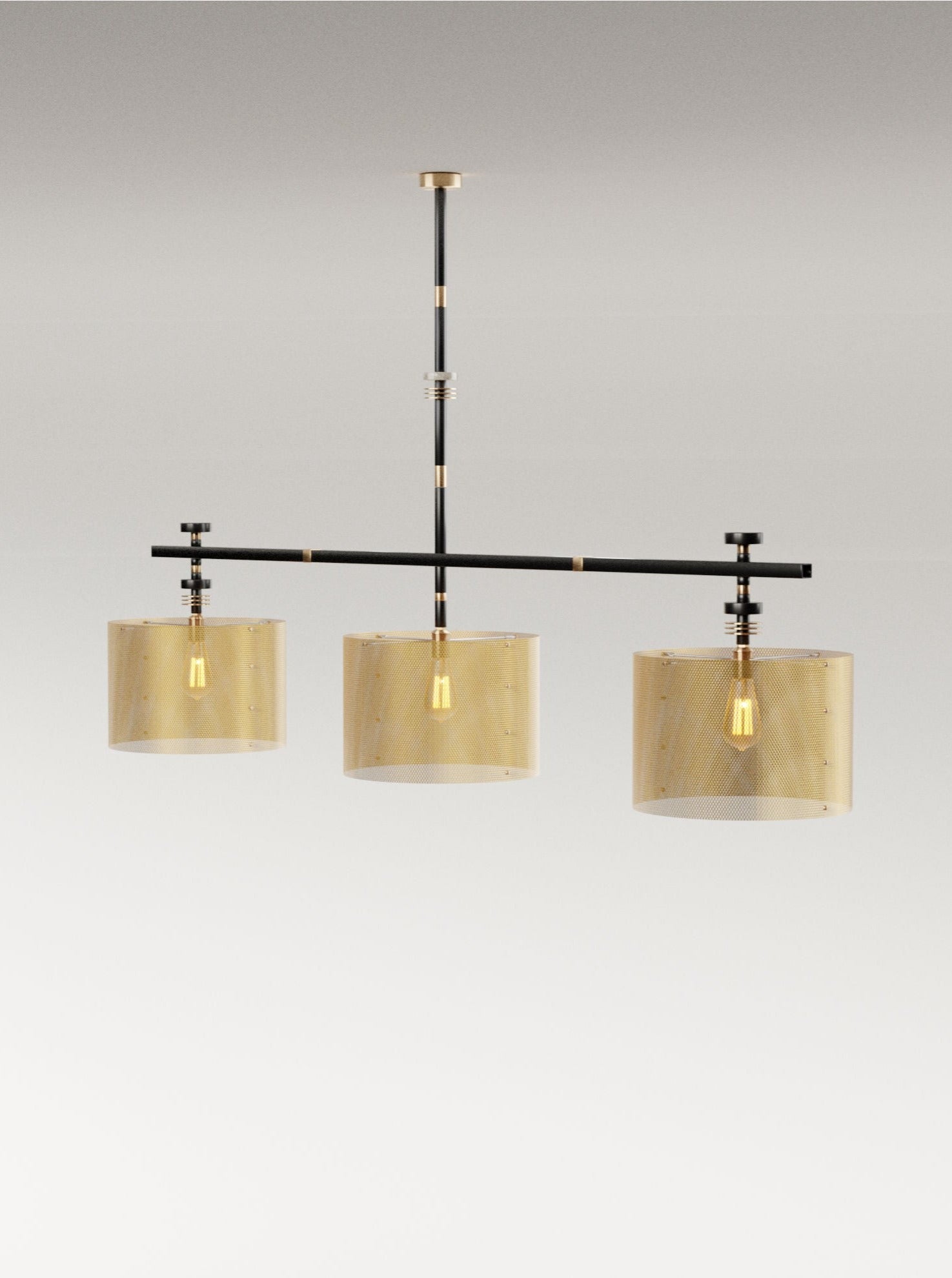 A Juliette Ceiling Light by Marine Breynaert with three translucent beige lampshades hanging from a horizontal black rod, each containing a visible filament bulb, against a light gray background.