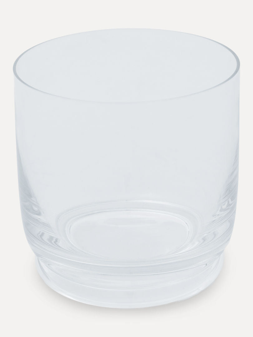 A Walter 02 - Rocks tumbler from Service Projects, crafted from lead-free crystal with a thick base, is placed against a plain, light background. The clear cylindrical glass, part of a set of 4, features a simple design with no decorative elements.