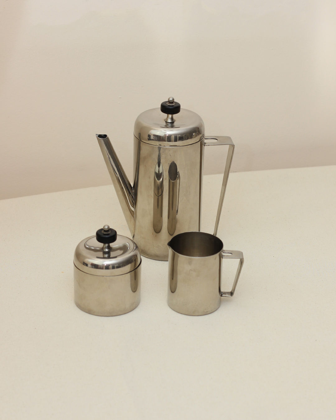 Polished steel Art Deco coffee set with pot, sugar bowl and creamer