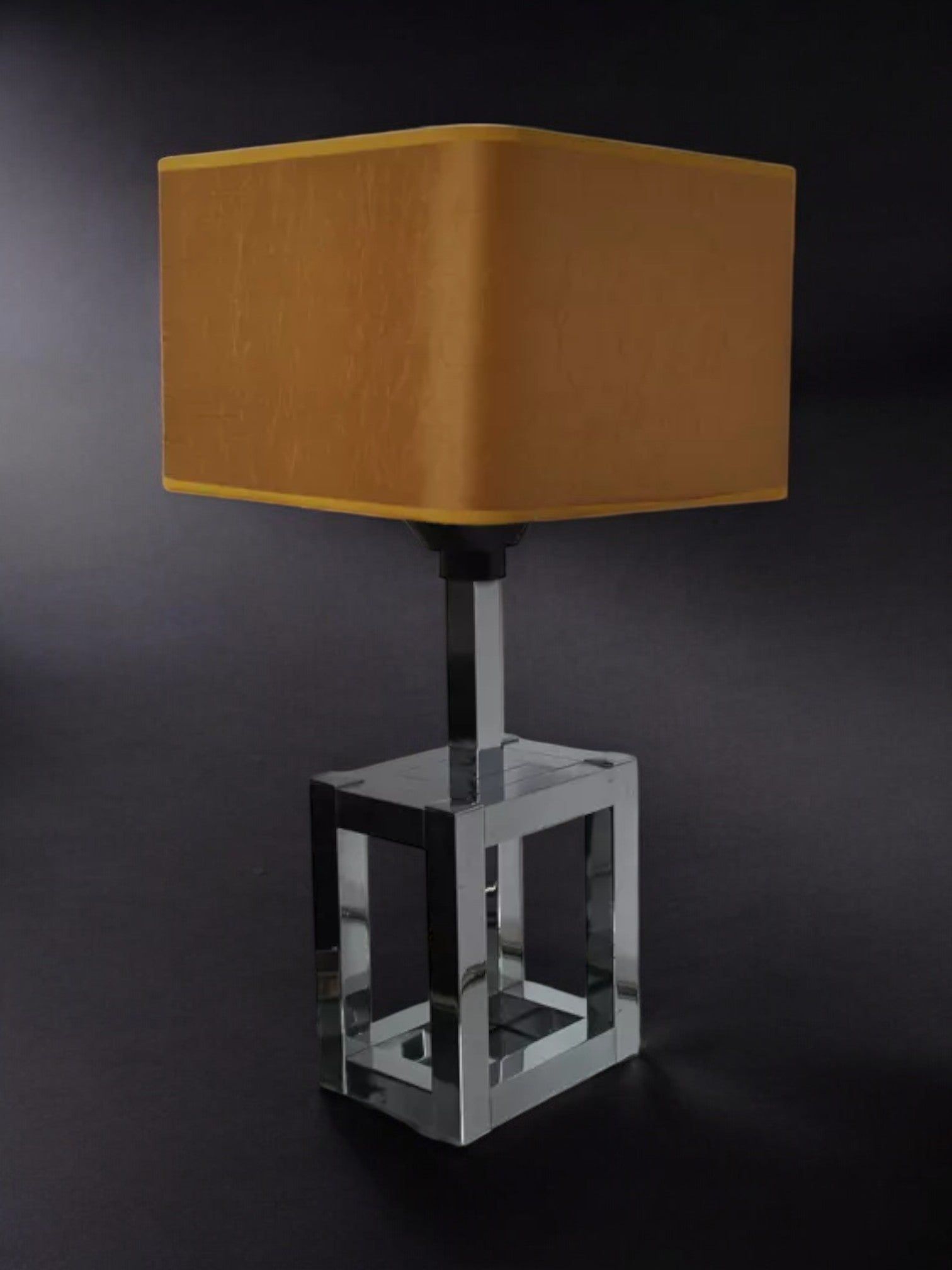 The BD Lumica Cubic Table Lamp by Malamar Studio (Italy, 1970) features a yellow square shade and chromed cubic base—an iconic modern piece that elevates any contemporary space.