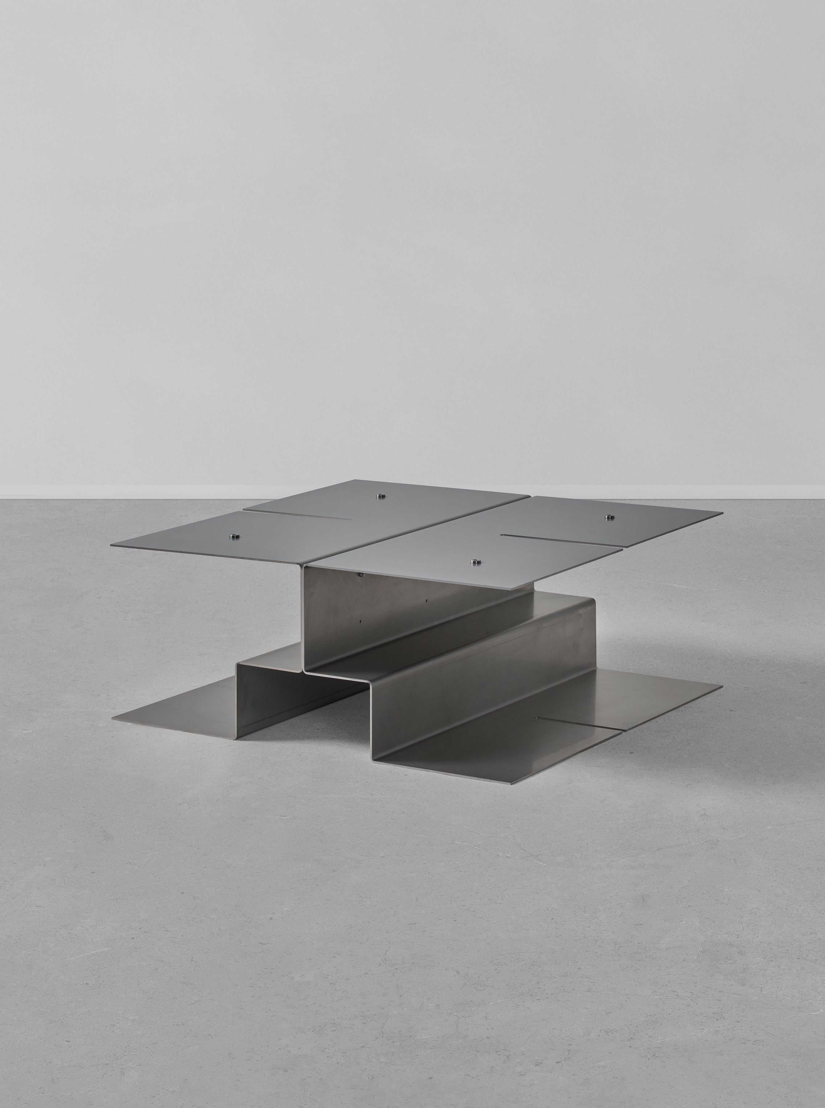 Folded stainless steel table with adjustable height and durable construction