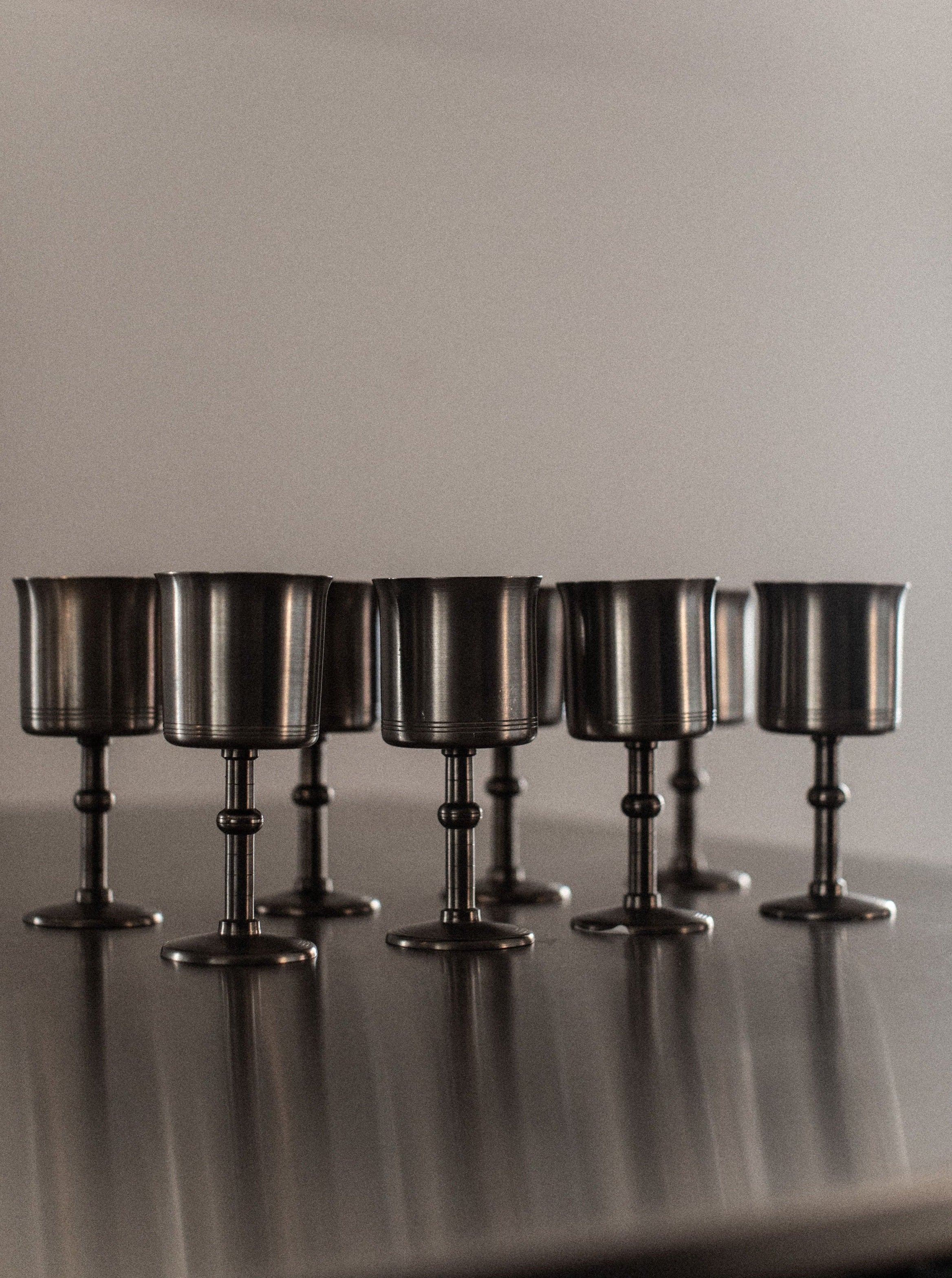 Set of elegant ceramic Art Deco cups with gold and black geometric pattern