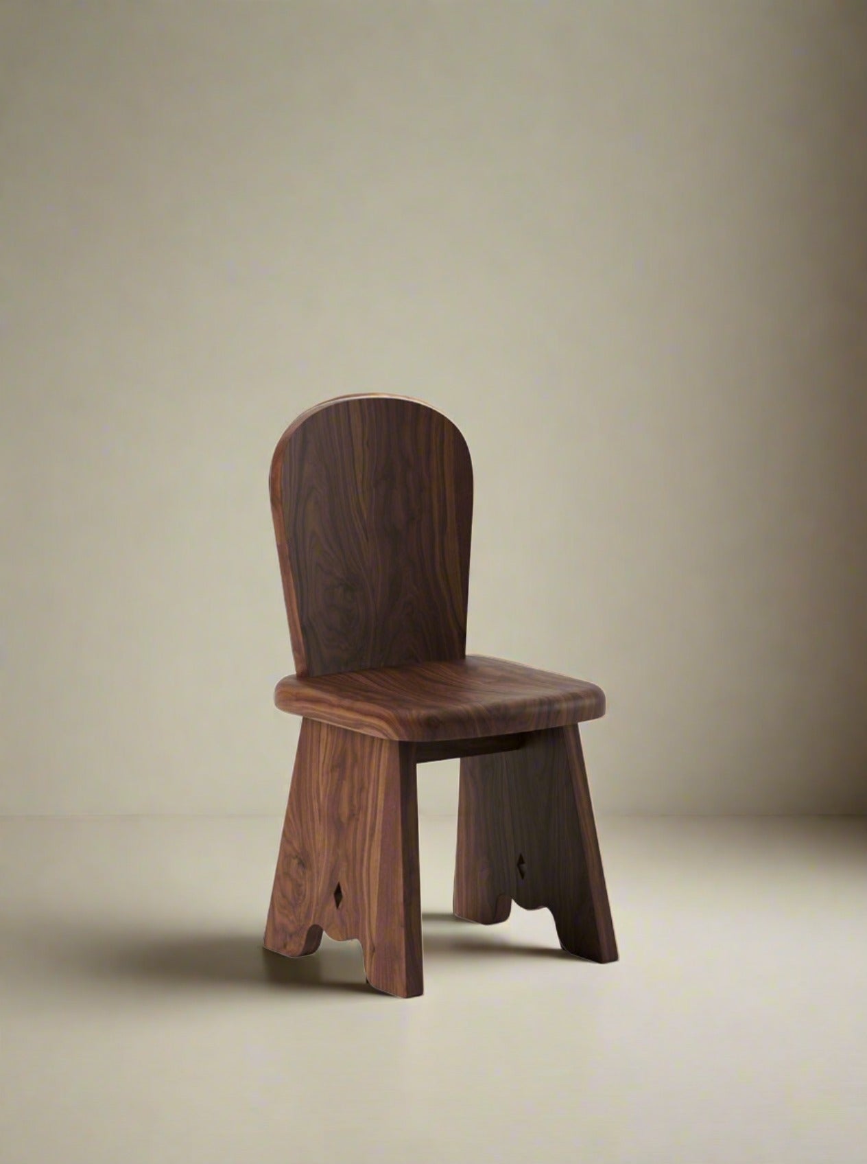 Rambling Chair in African Mahogany Wood with curved armrests and slatted back