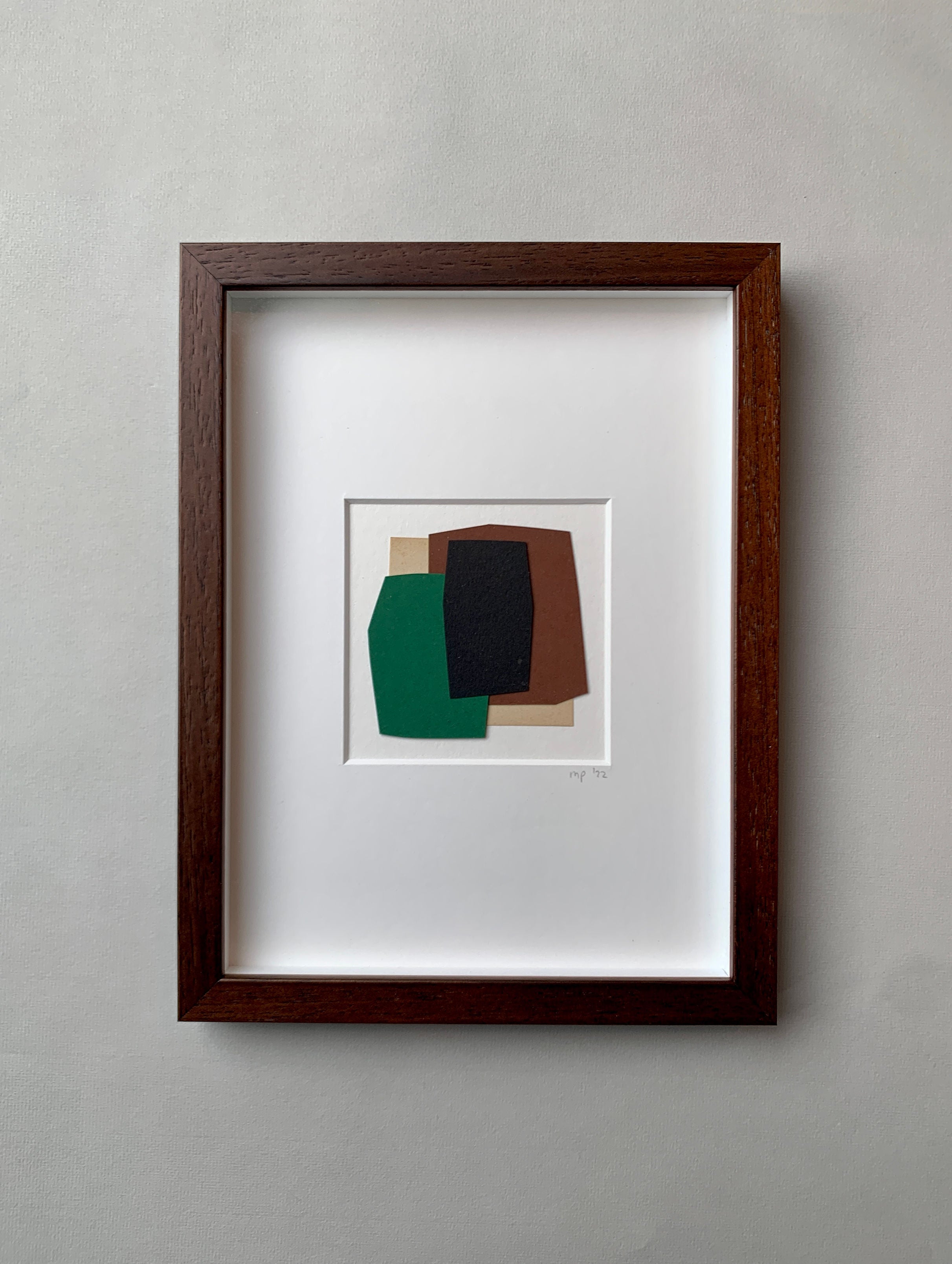 The "Green Composition - Paper Collage" by Marie Pomme Adriaansen features framed abstract art with overlapping geometric shapes in green, black, and brown on white. It comes in a dark wooden frame with a certificate of authenticity.