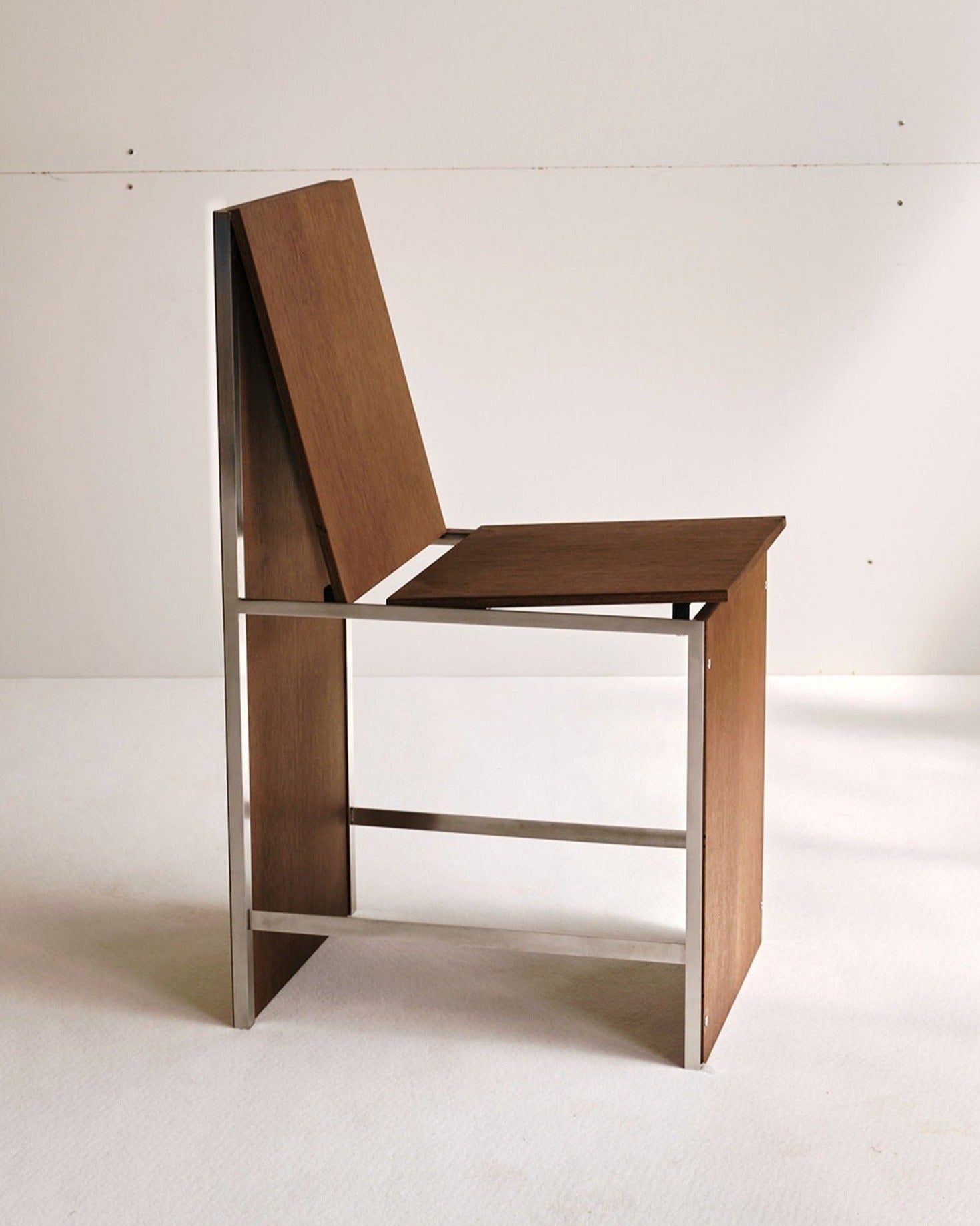 Solid oak finish chair with ergonomic design and comfortable cushioned seat