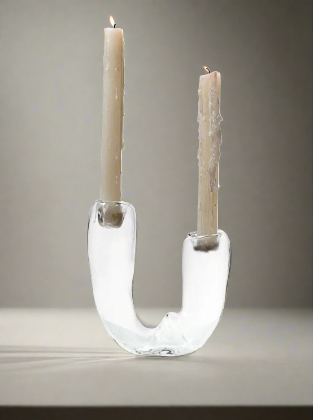 Modern black metal candle holder with a sleek and elegant design