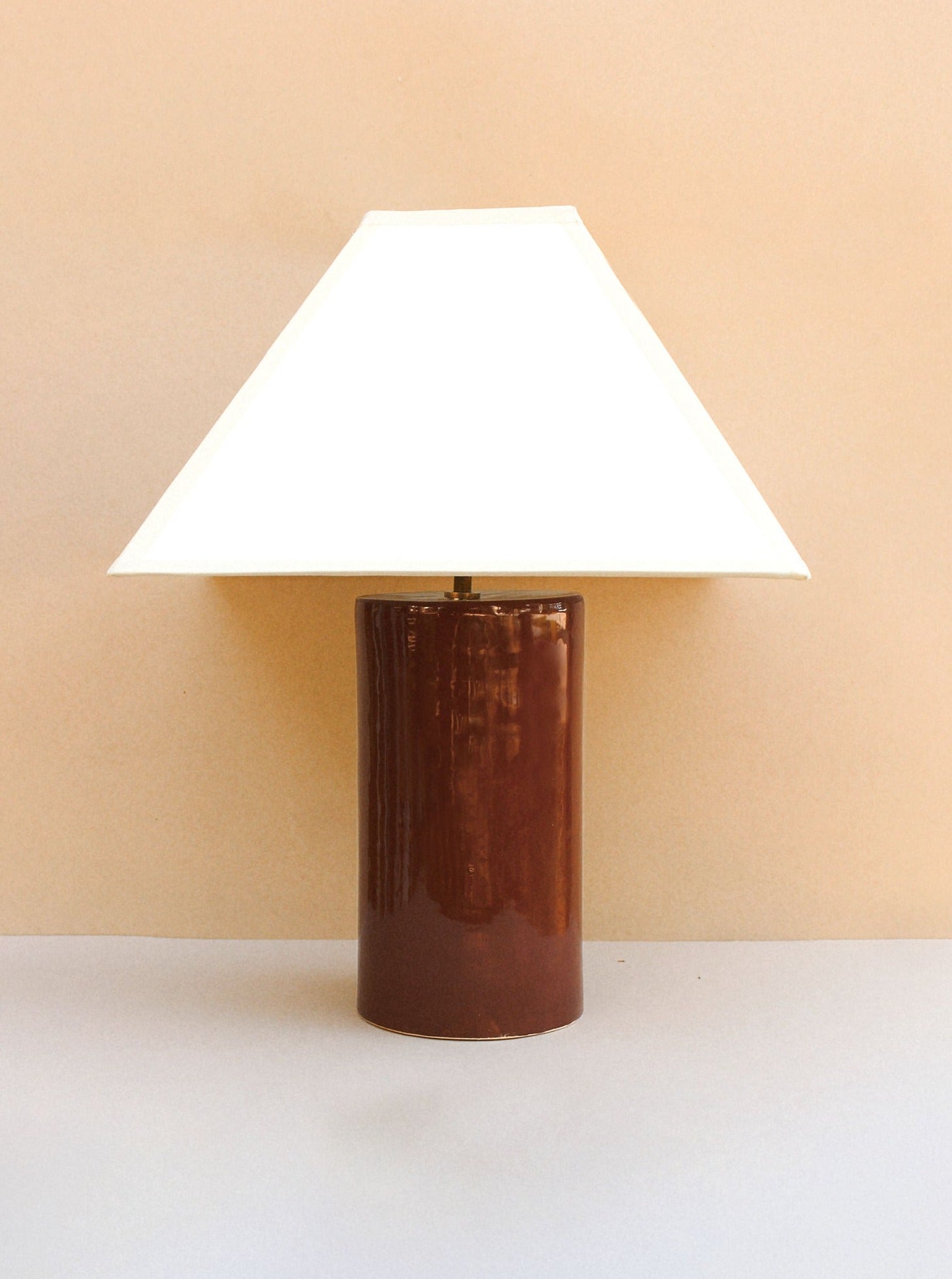 Hacienda Lamp (Cacao) illuminating a cozy living room corner